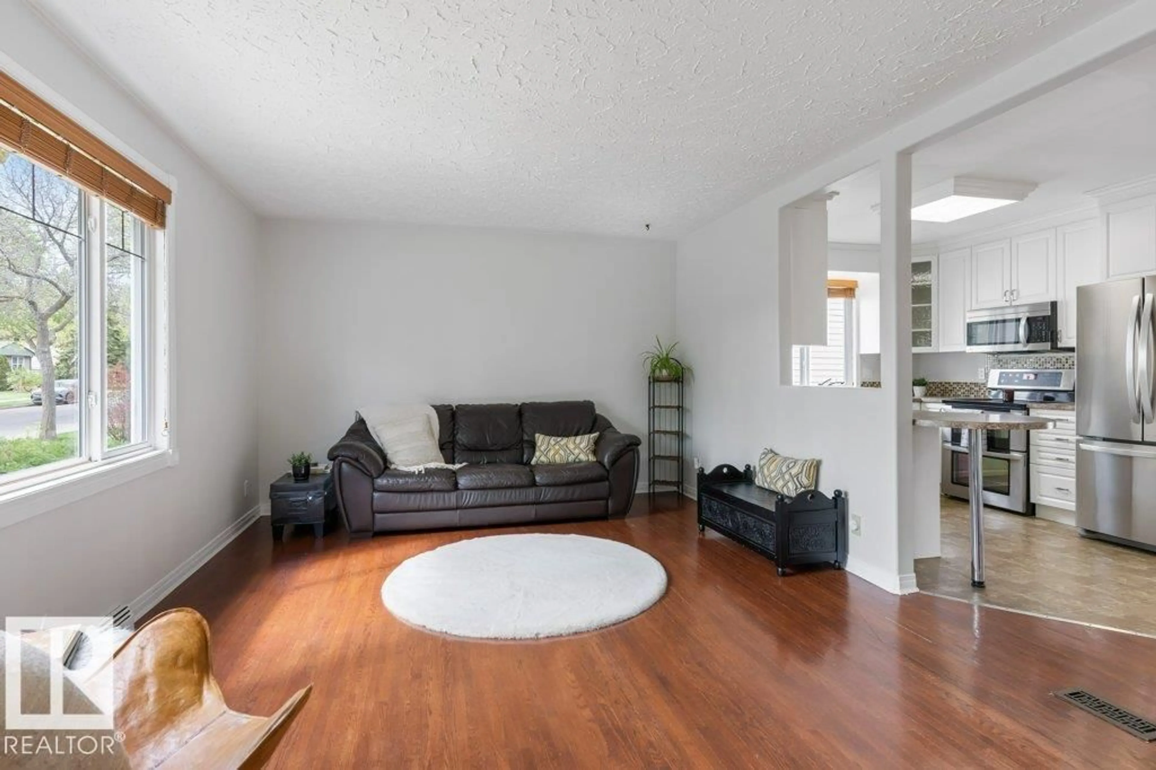 Living room with furniture, unknown for 13056 SHERBROOKE AV, Edmonton Alberta T5L4E9