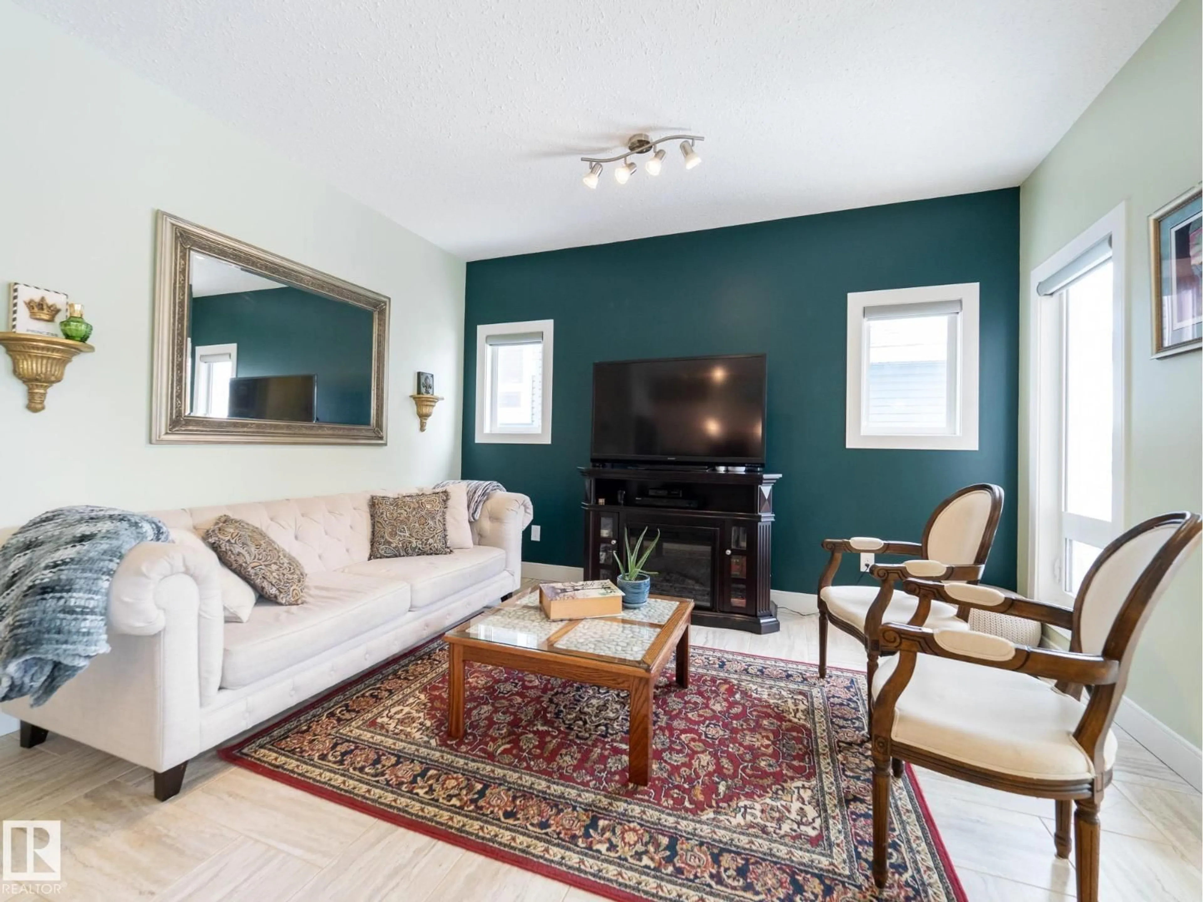 Living room with furniture, unknown for 13035 132 AV, Edmonton Alberta T5L3R2