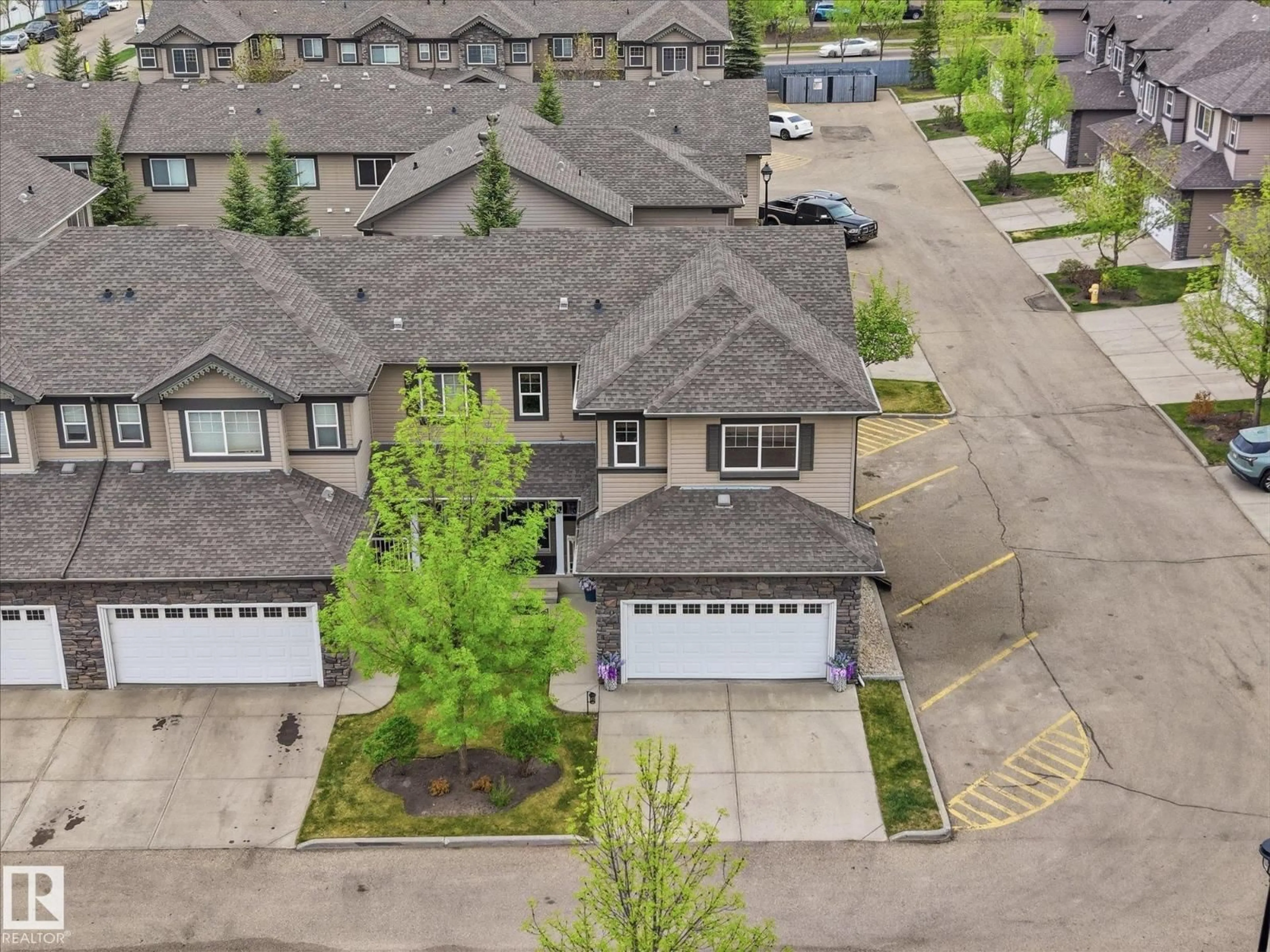 A pic from outside/outdoor area/front of a property/back of a property/a pic from drone, street for 112 RUE MONETTE, Beaumont Alberta T4X1T7