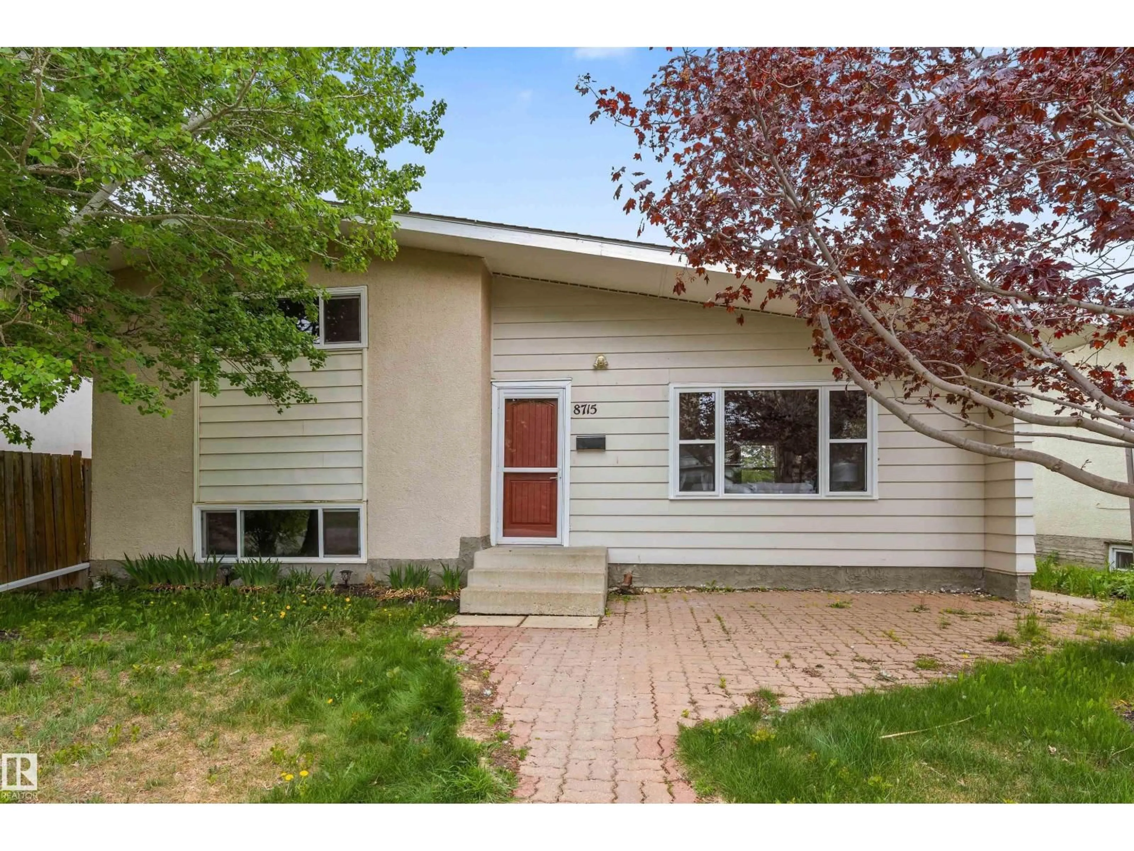 Home with vinyl exterior material, street for NW - 8715 164A ST, Edmonton Alberta T5R2R2