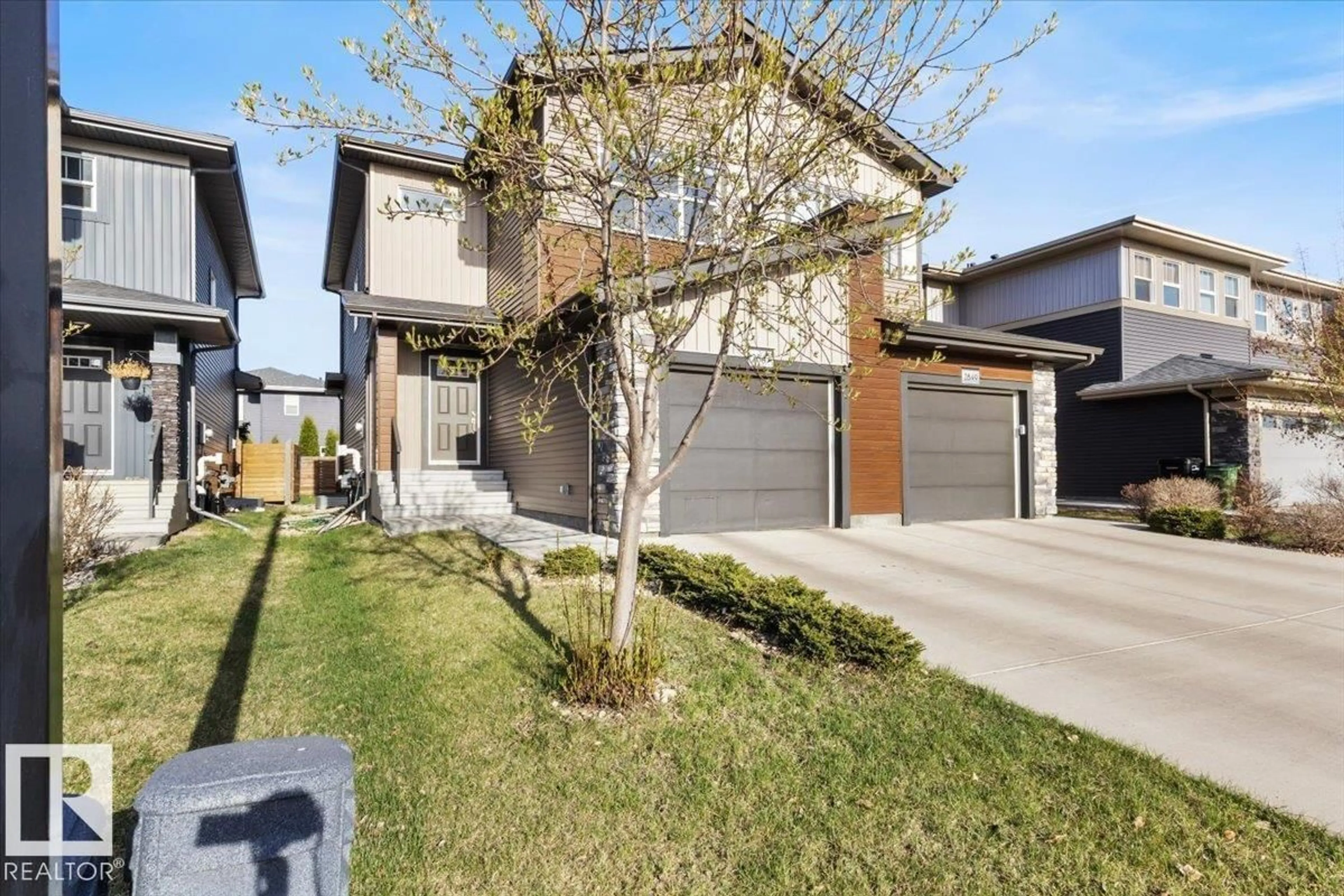Home with brick exterior material, street for 2847 KOSHAL CR, Edmonton Alberta T6W3J8