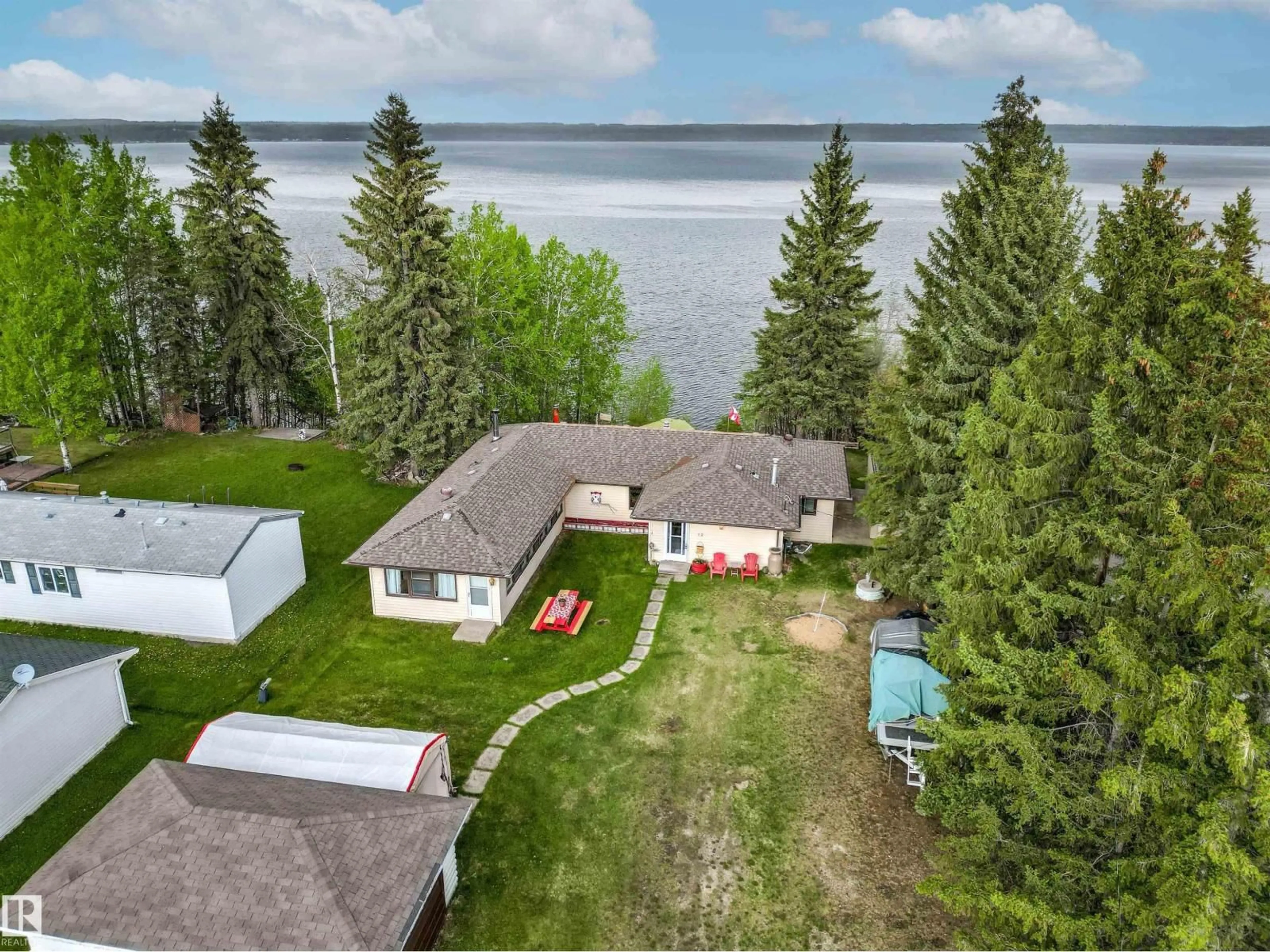 A pic from outside/outdoor area/front of a property/back of a property/a pic from drone, water/lake/river/ocean view for 12 53004 RGE ROAD 54 A, Rural Parkland County Alberta T0E2B0