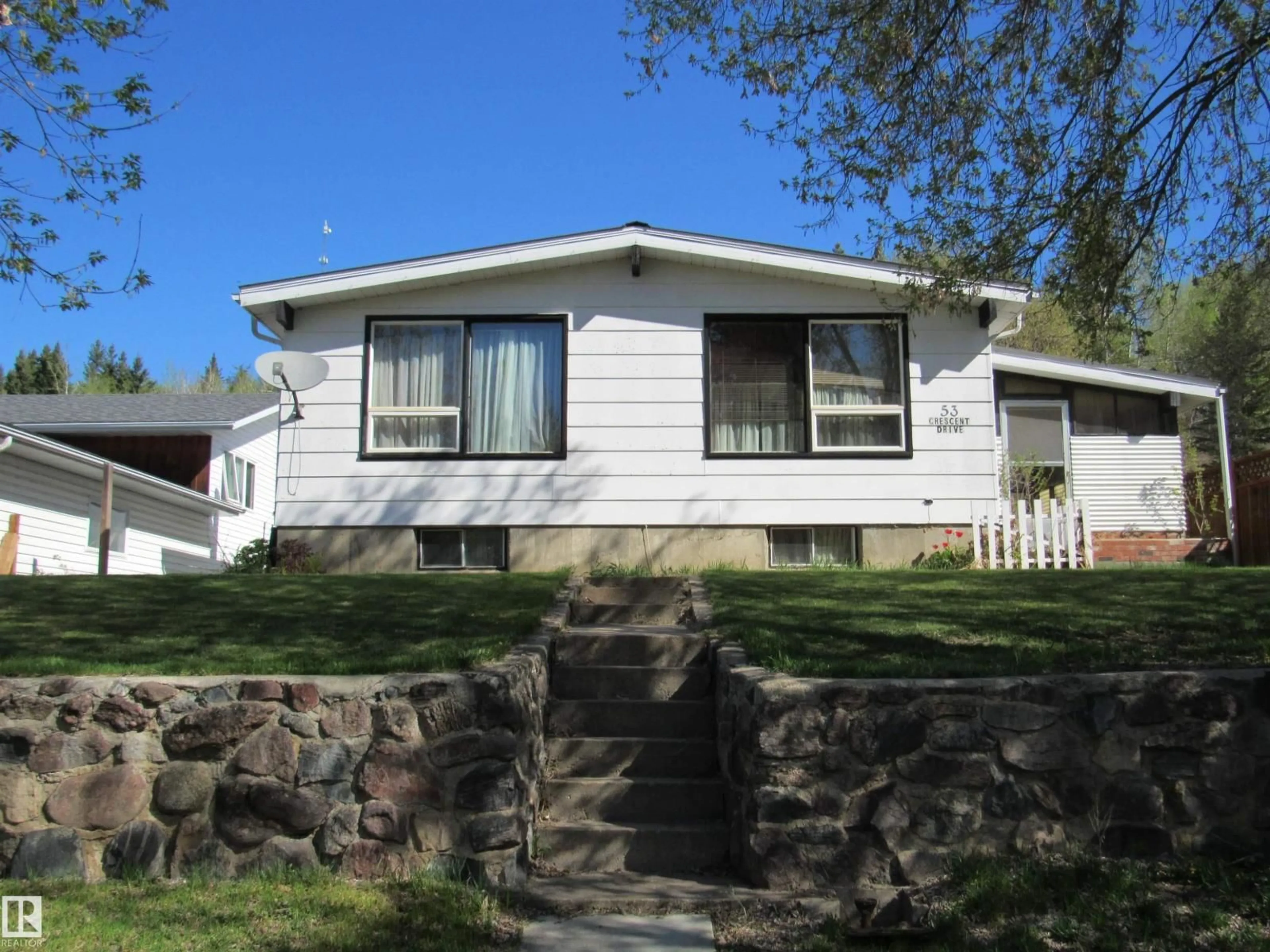 Home with vinyl exterior material, street for 53 CRESCENT DRIVE, Fort Assiniboine Alberta T0G1A0
