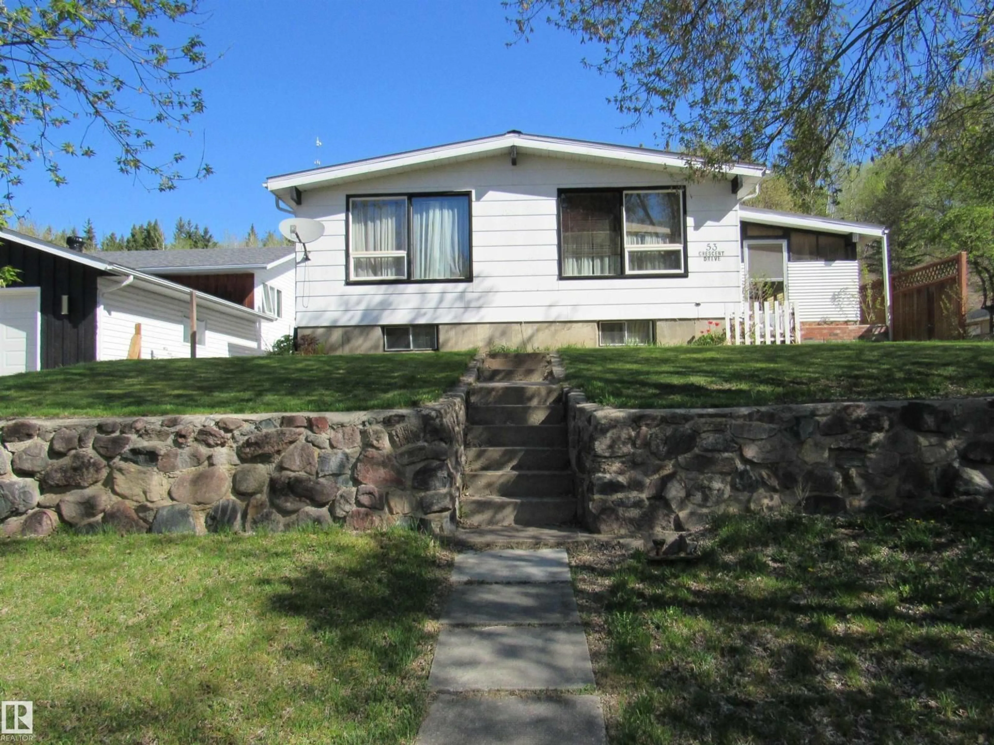 Home with vinyl exterior material, street for 53 CRESCENT DRIVE, Fort Assiniboine Alberta T0G1A0