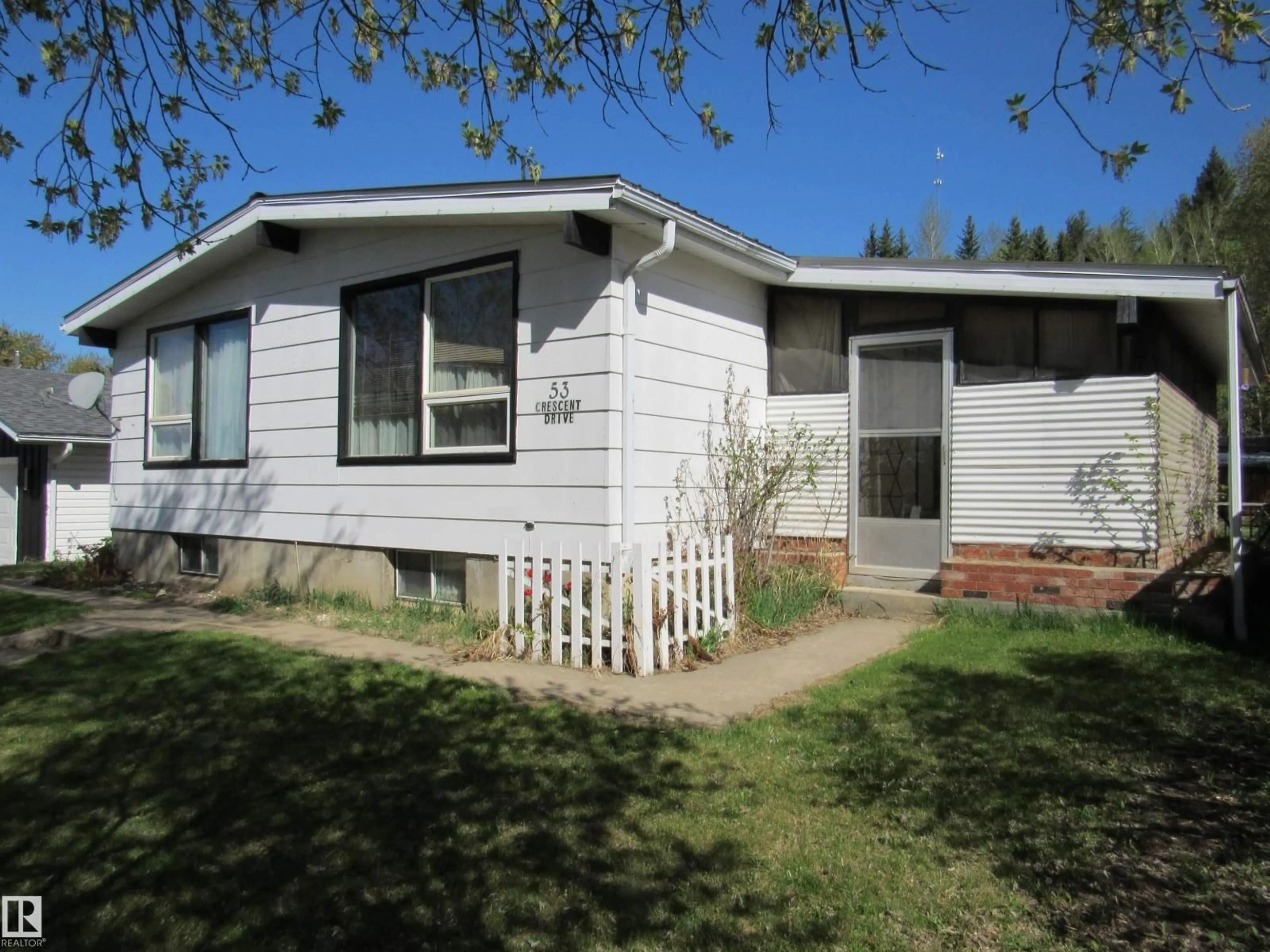 Home with vinyl exterior material, street for 53 CRESCENT DRIVE, Fort Assiniboine Alberta T0G1A0