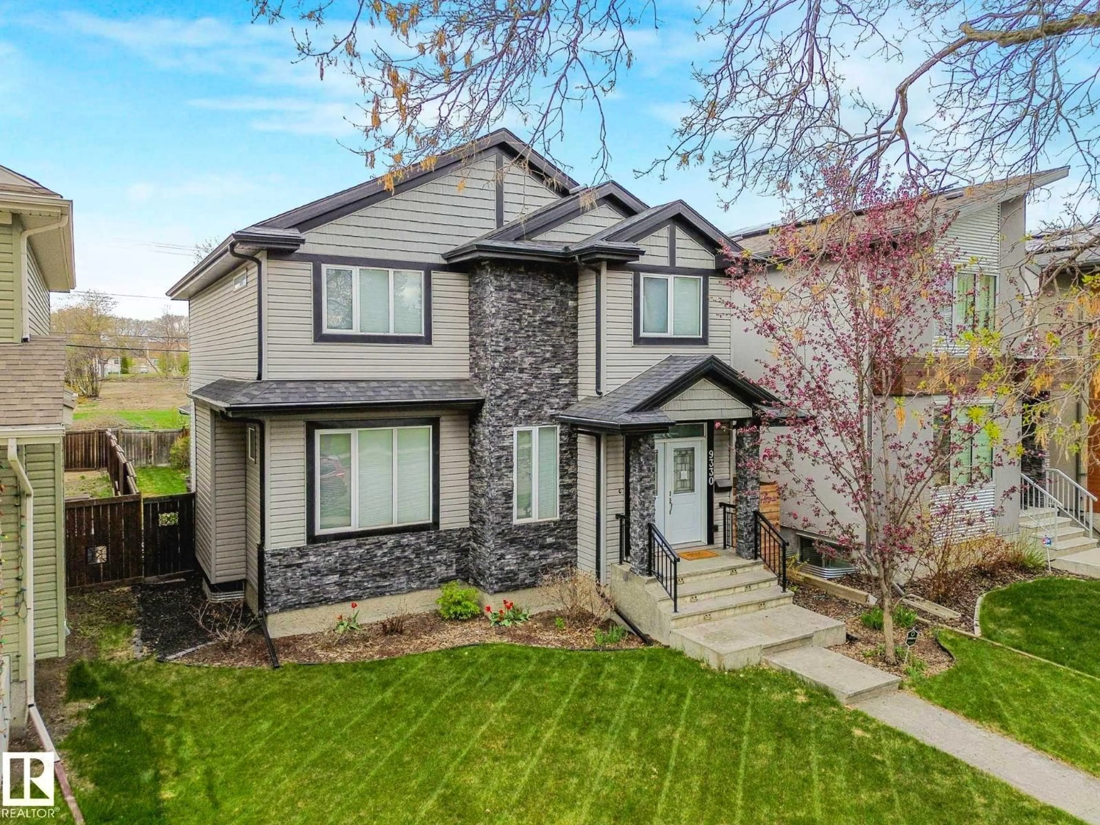 Home with brick exterior material, street for 9330 83 ST, Edmonton Alberta T6C2Z7