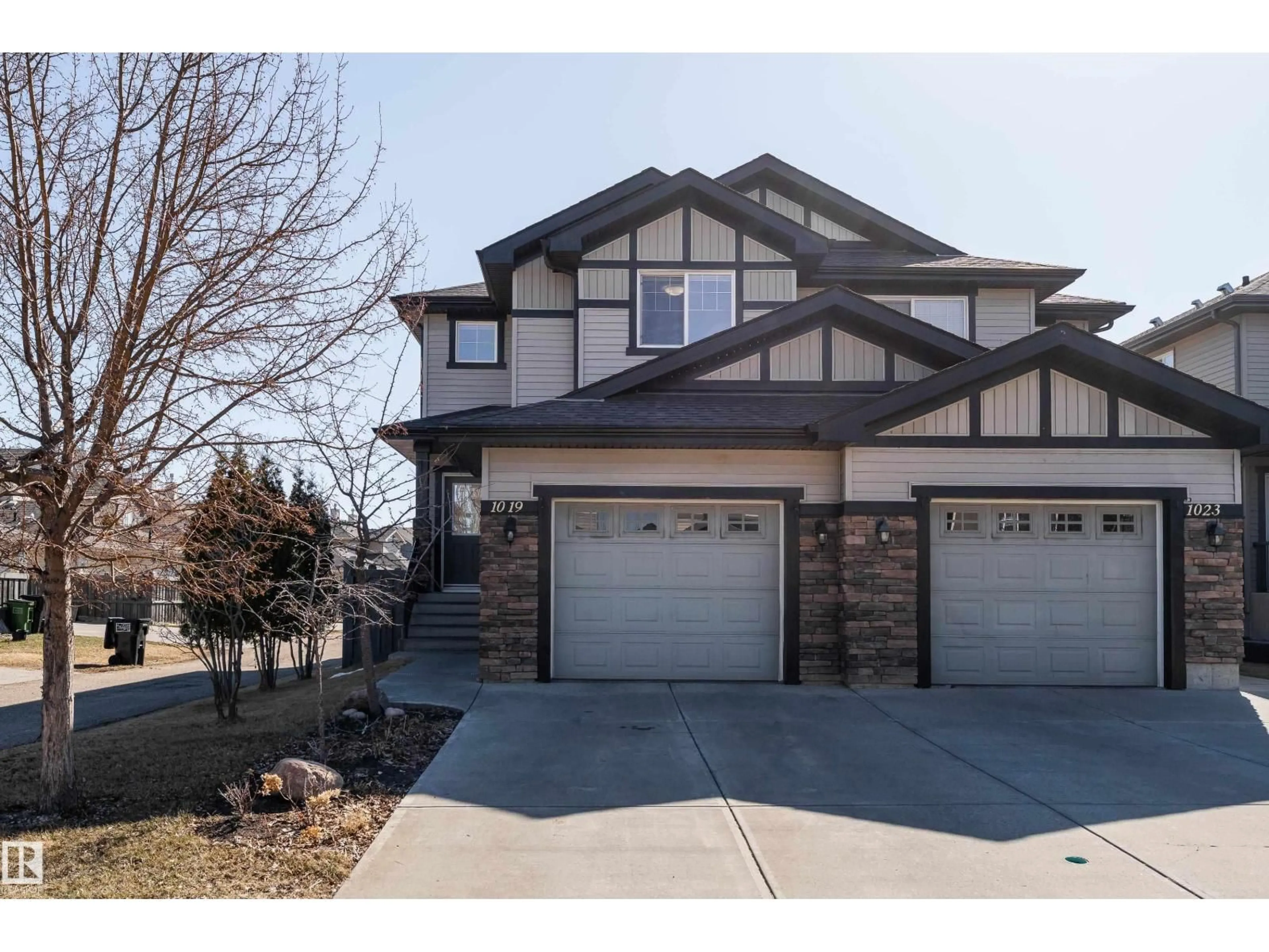 Home with vinyl exterior material, street for SW - 1019 177 ST, Edmonton Alberta T6W1Z9