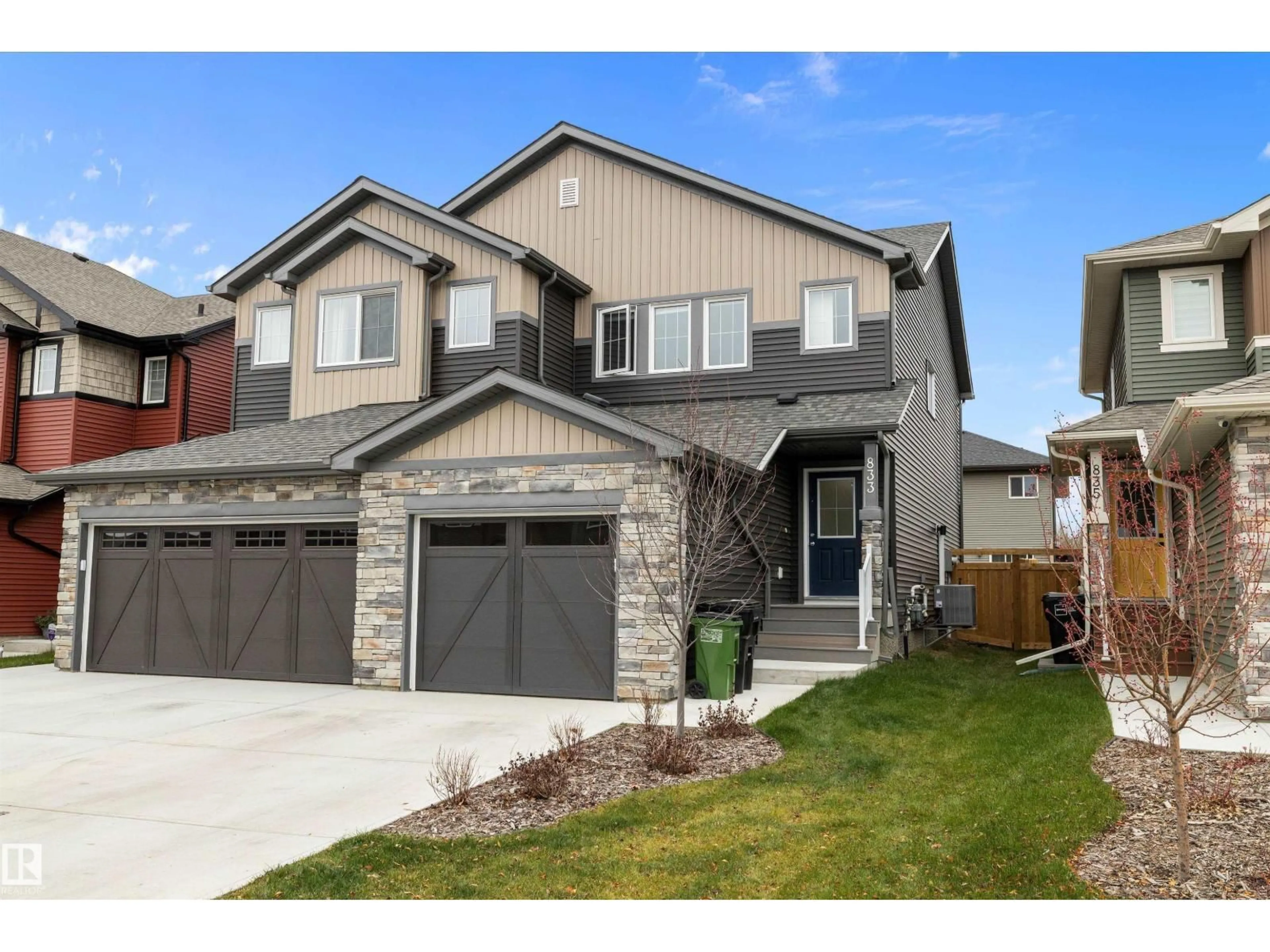 Home with brick exterior material, street for 833 NORTHERN HARRIER LN, Edmonton Alberta T5S0P8