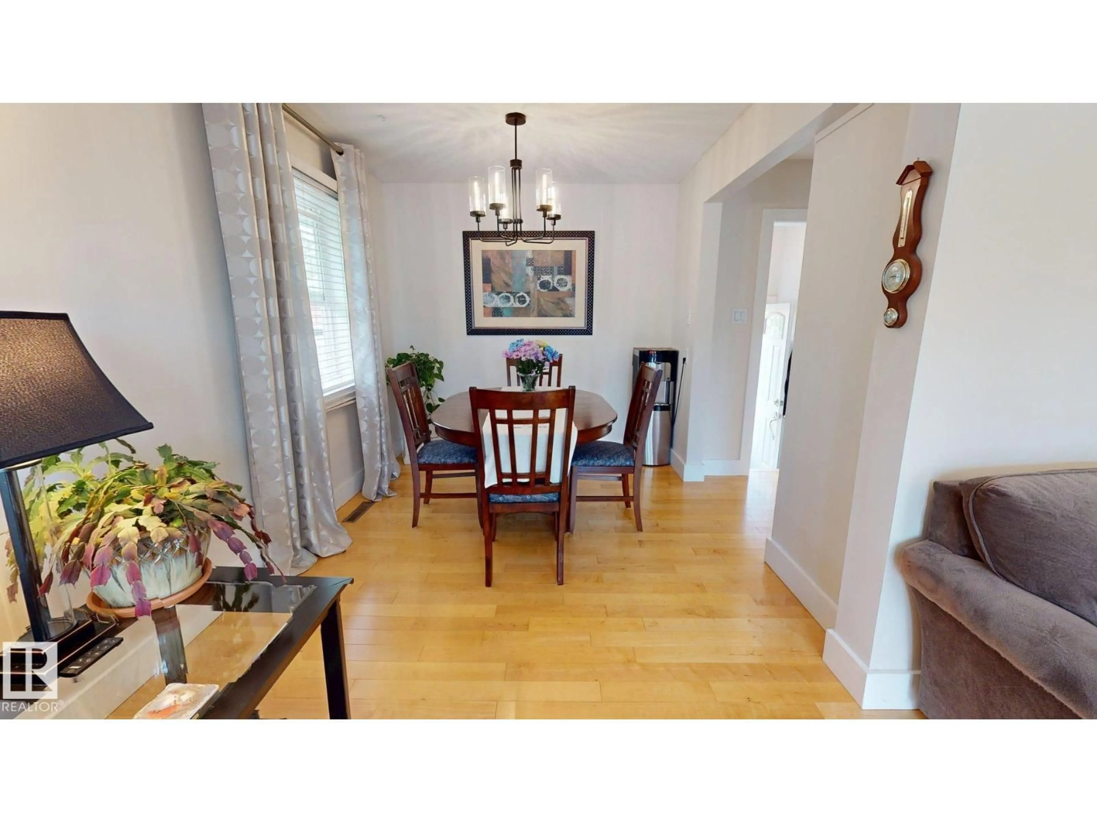 Dining room, wood/laminate floor for 15627 83 AV, Edmonton Alberta T5R3T6