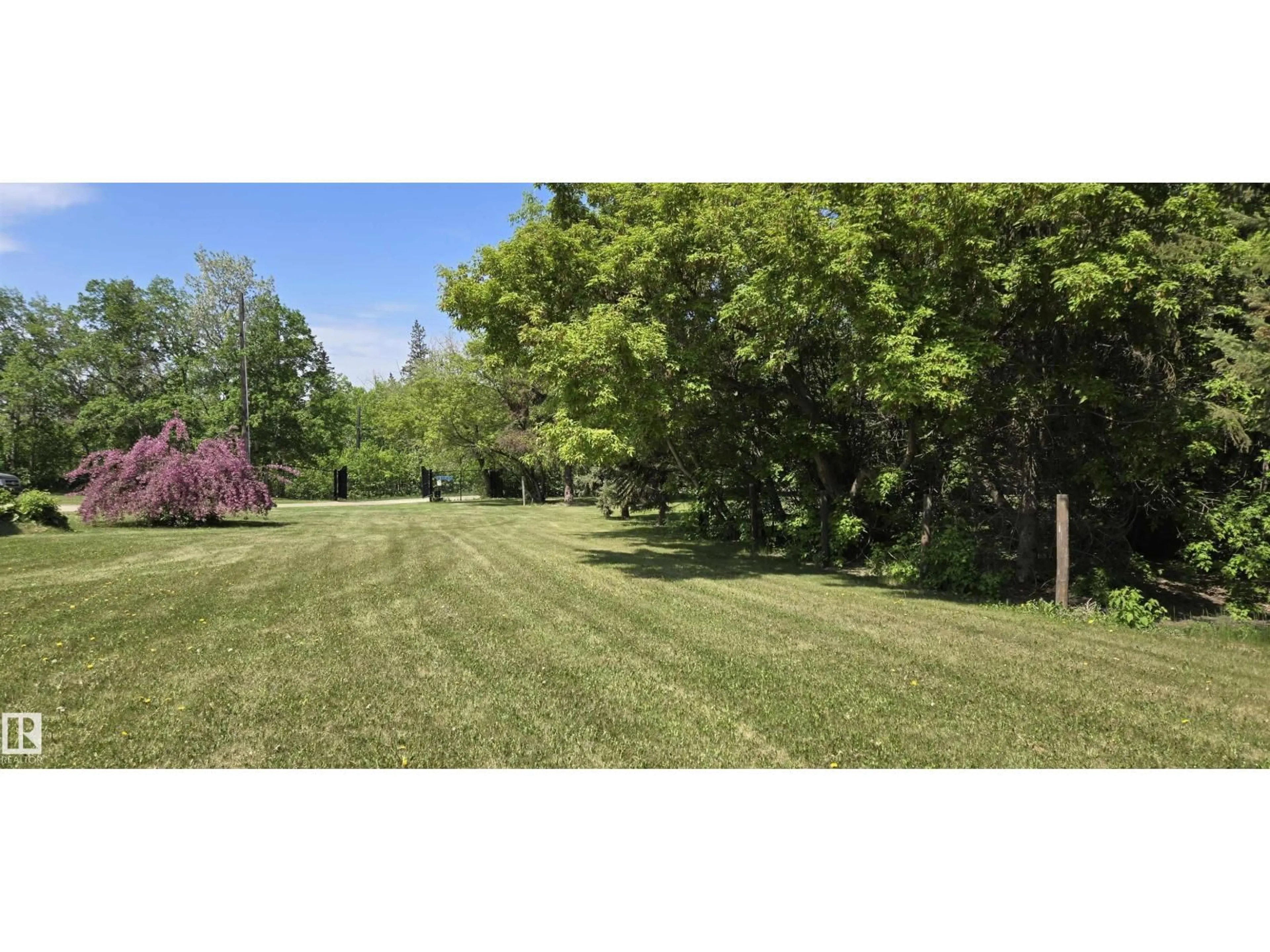 A pic from outside/outdoor area/front of a property/back of a property/a pic from drone, forest/trees view for 11911 231 ST, Edmonton Alberta T5S2C2