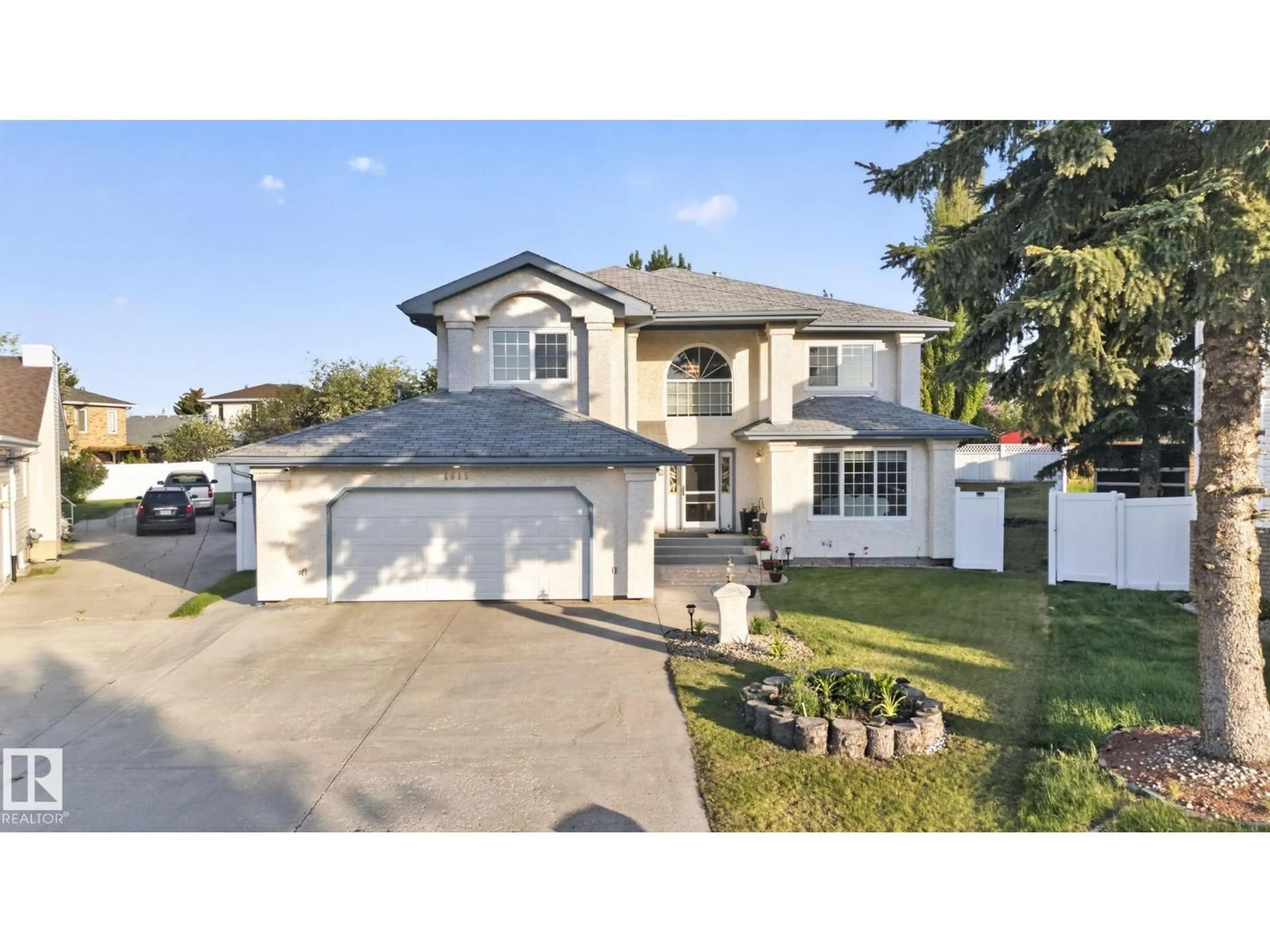 Home with vinyl exterior material, street for 4615 43A AV NW, Edmonton Alberta T6L6L9