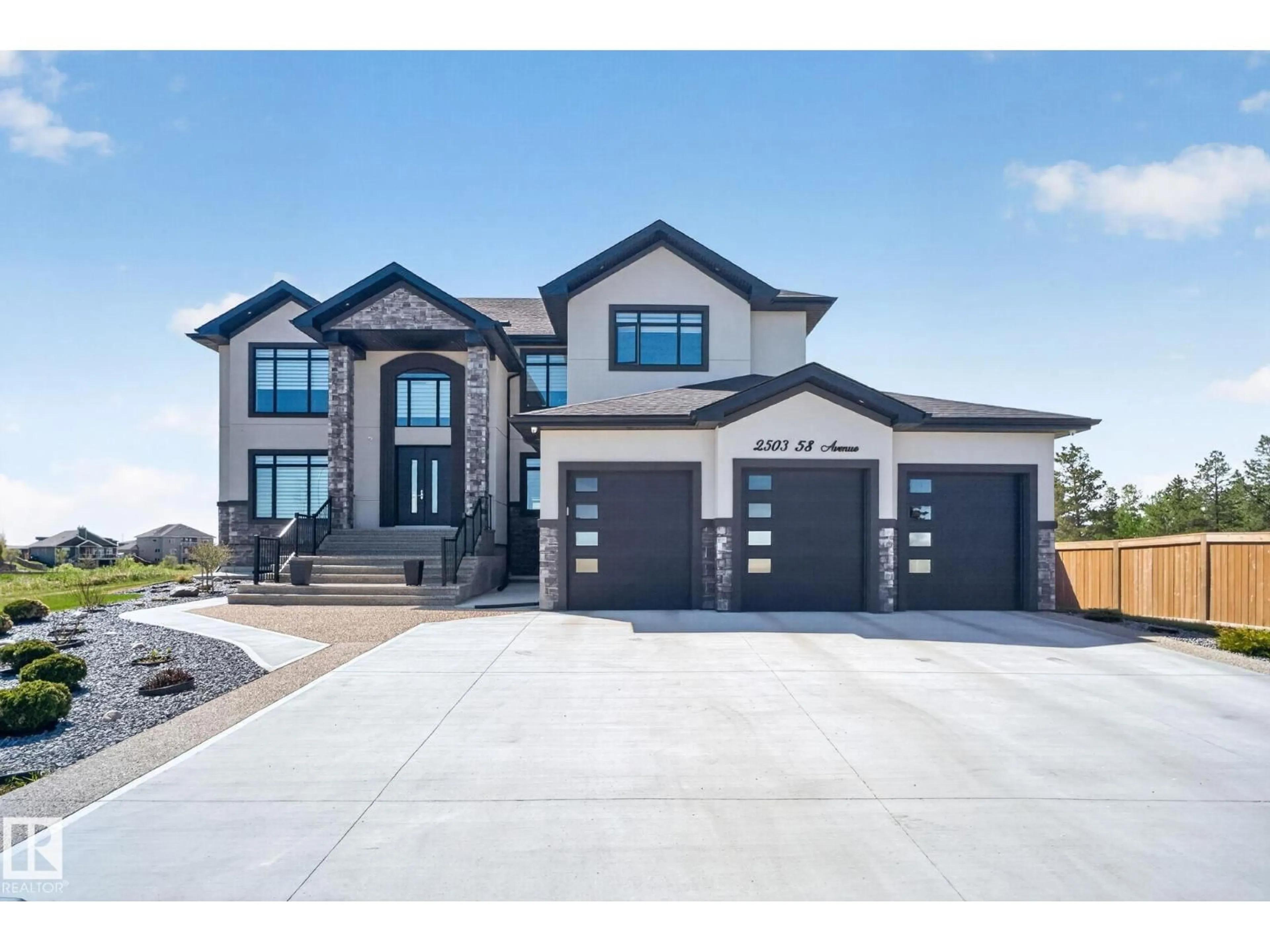 Home with brick exterior material, street for 2503 58 AV, Rural Leduc County Alberta T4X0X5