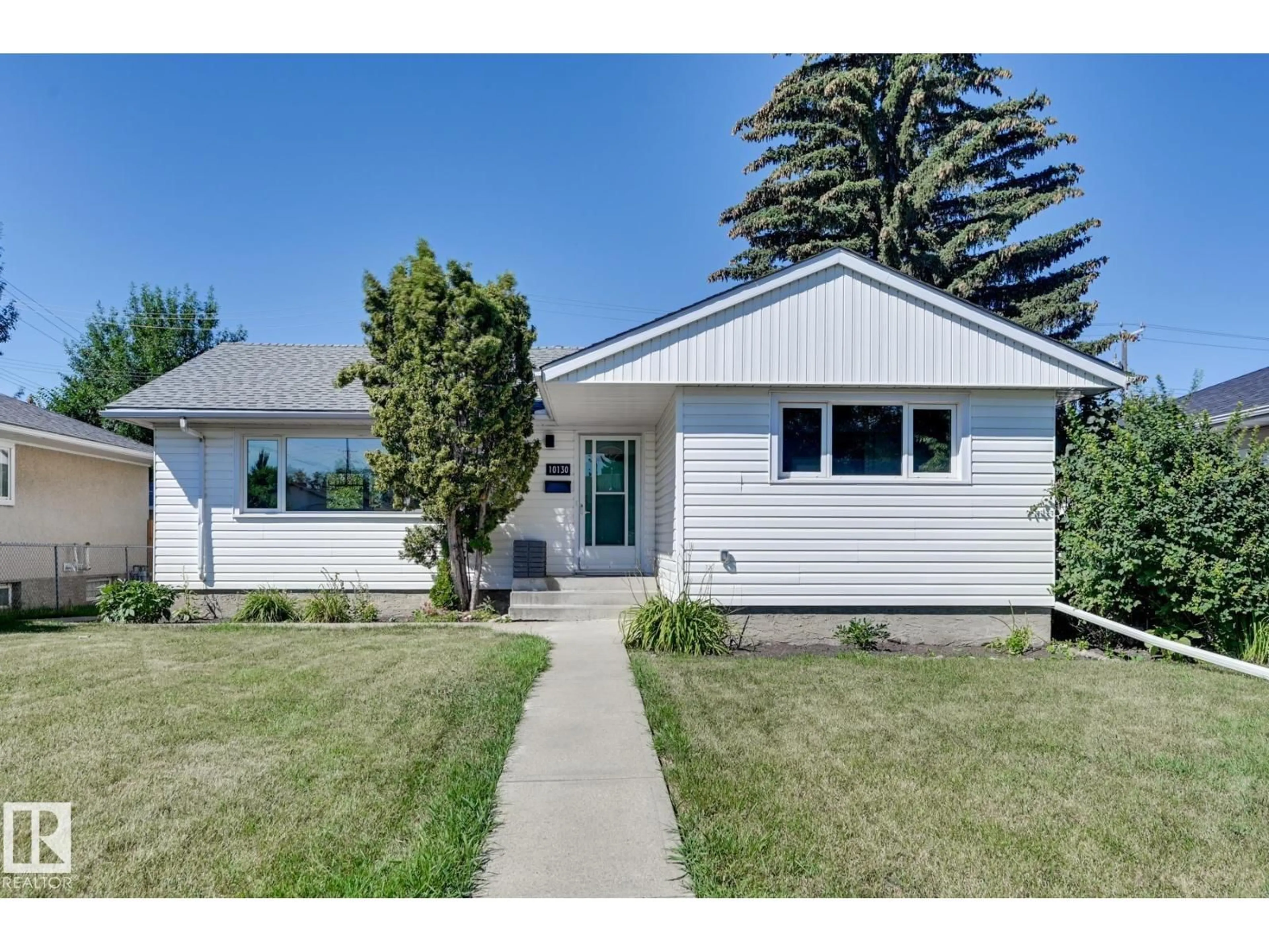 Home with vinyl exterior material, street for NW - 10130 62 ST, Edmonton Alberta T6A2L8