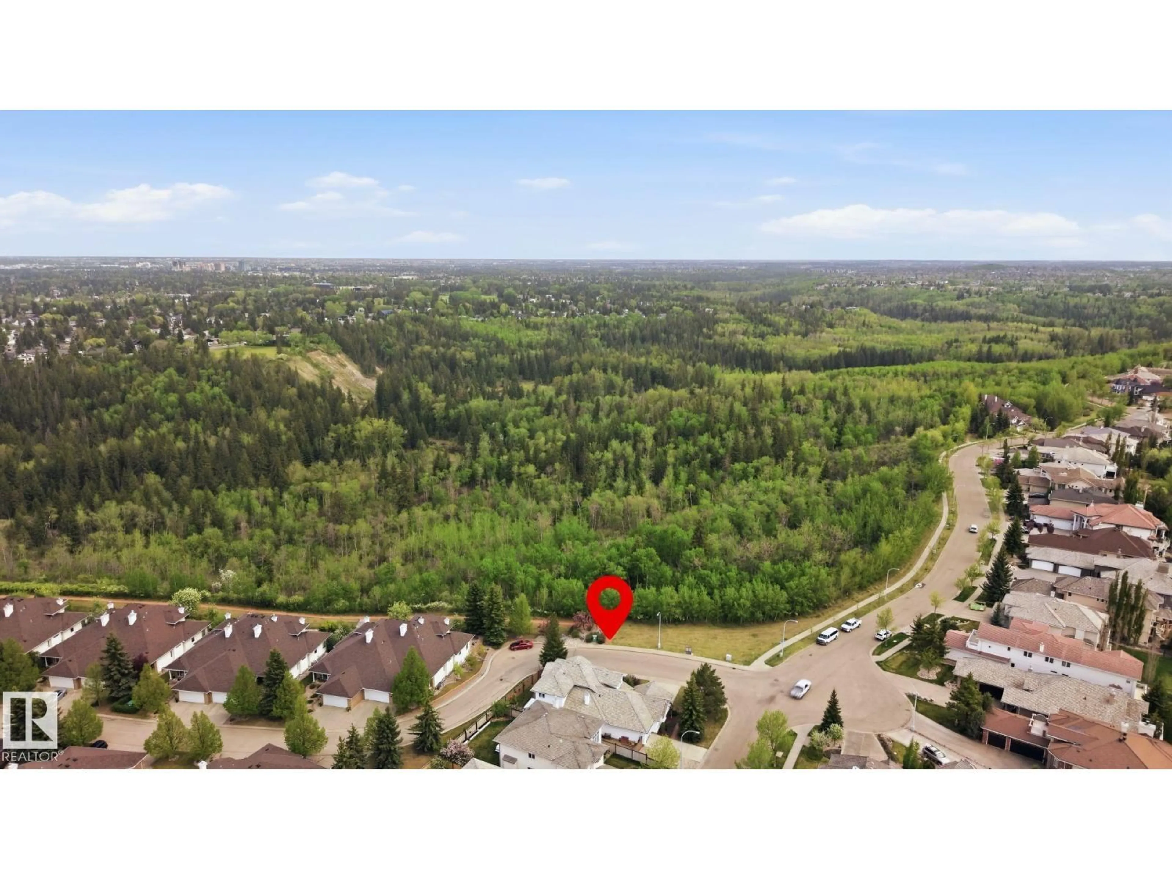 A pic from outside/outdoor area/front of a property/back of a property/a pic from drone, forest/trees view for 777 BUTTERWORTH DR, Edmonton Alberta T6R2P6