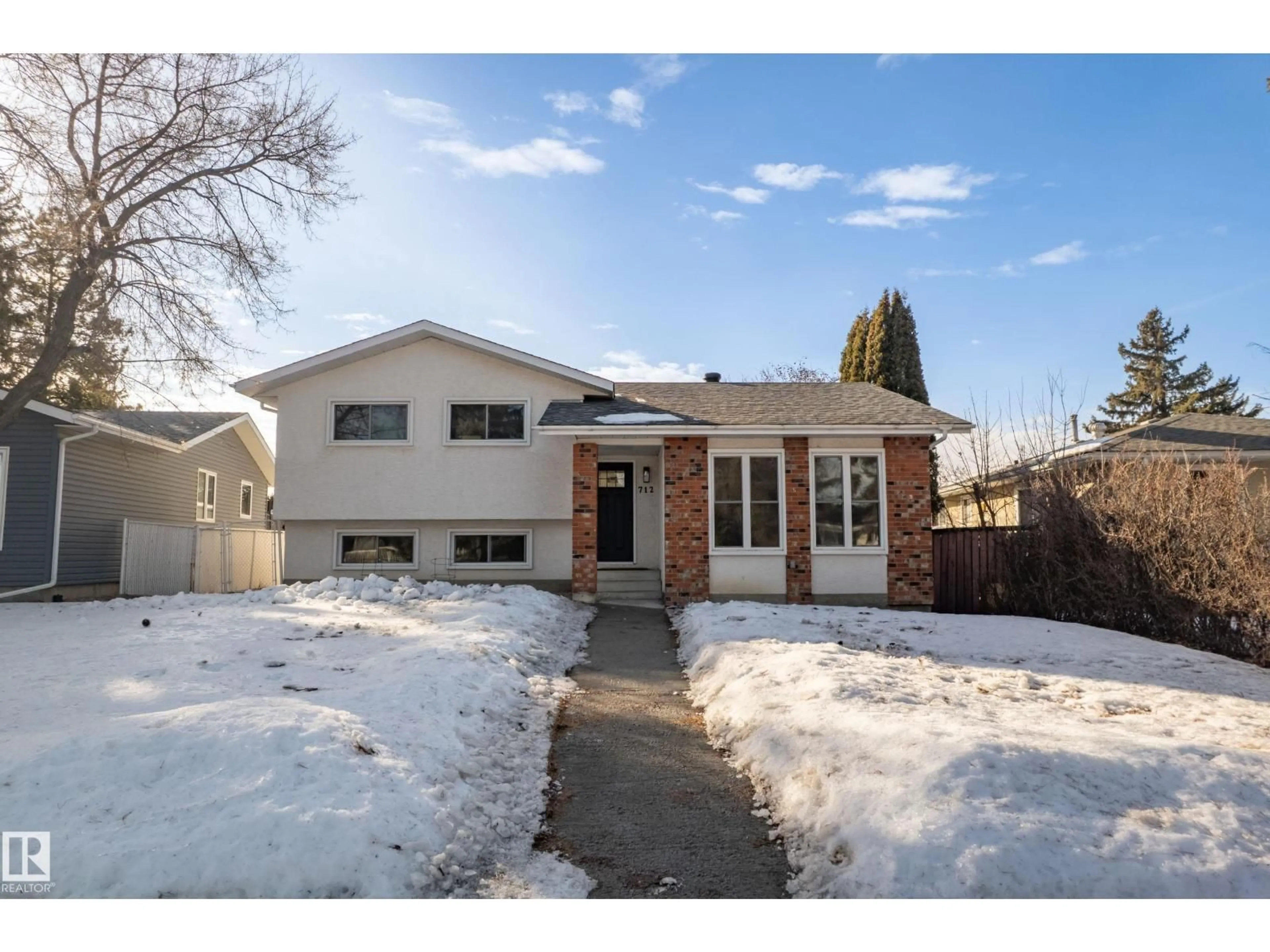 Home with brick exterior material, street for 712 KNOTTWOOD RD, Edmonton Alberta T6K1X9