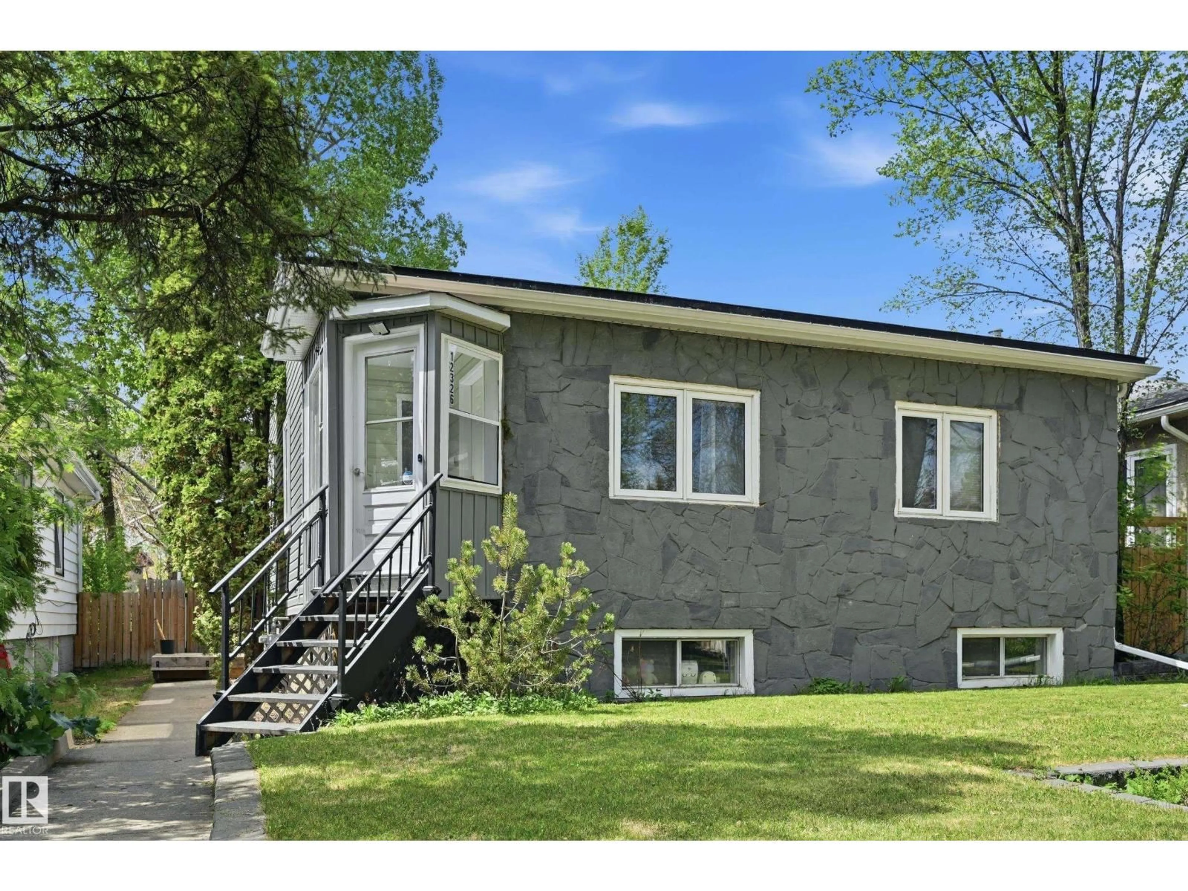 Home with vinyl exterior material, street for NW - 12326 92 ST, Edmonton Alberta T5G1B6