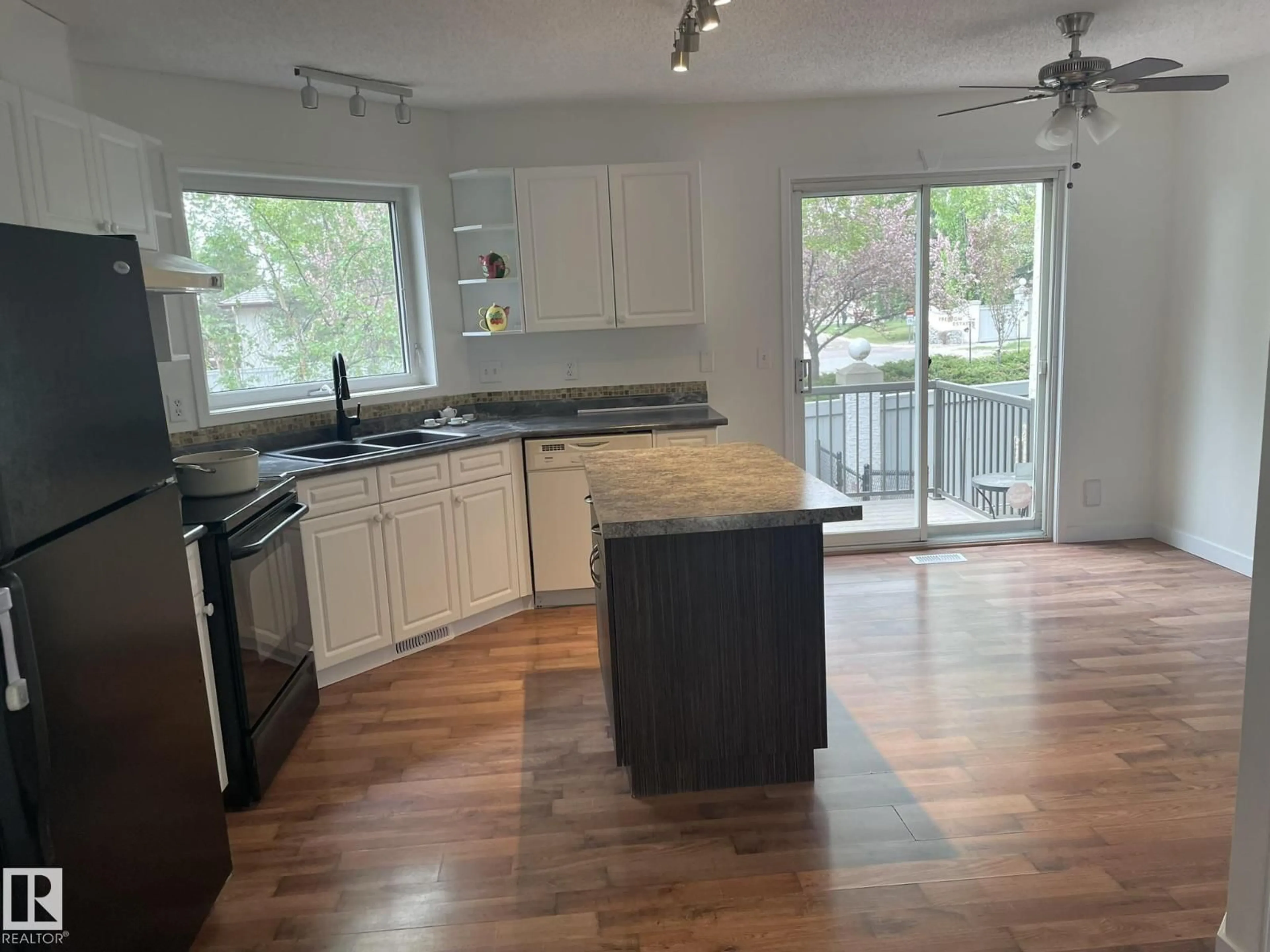 Open concept kitchen, wood/laminate floor for #2 - 1295 CARTER CREST RD, Edmonton Alberta T5R2N6