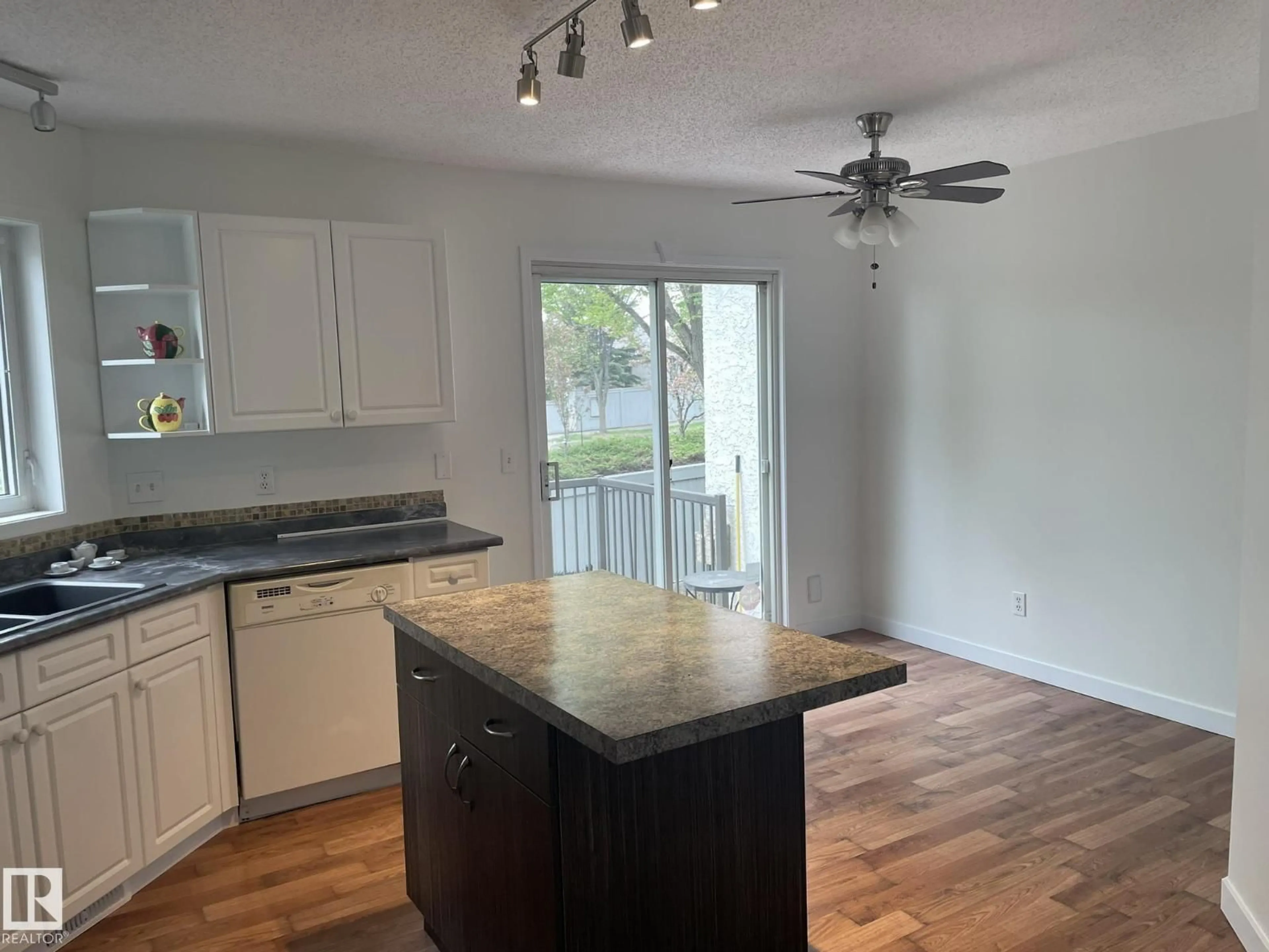 Open concept kitchen, wood/laminate floor for #2 - 1295 CARTER CREST RD, Edmonton Alberta T5R2N6