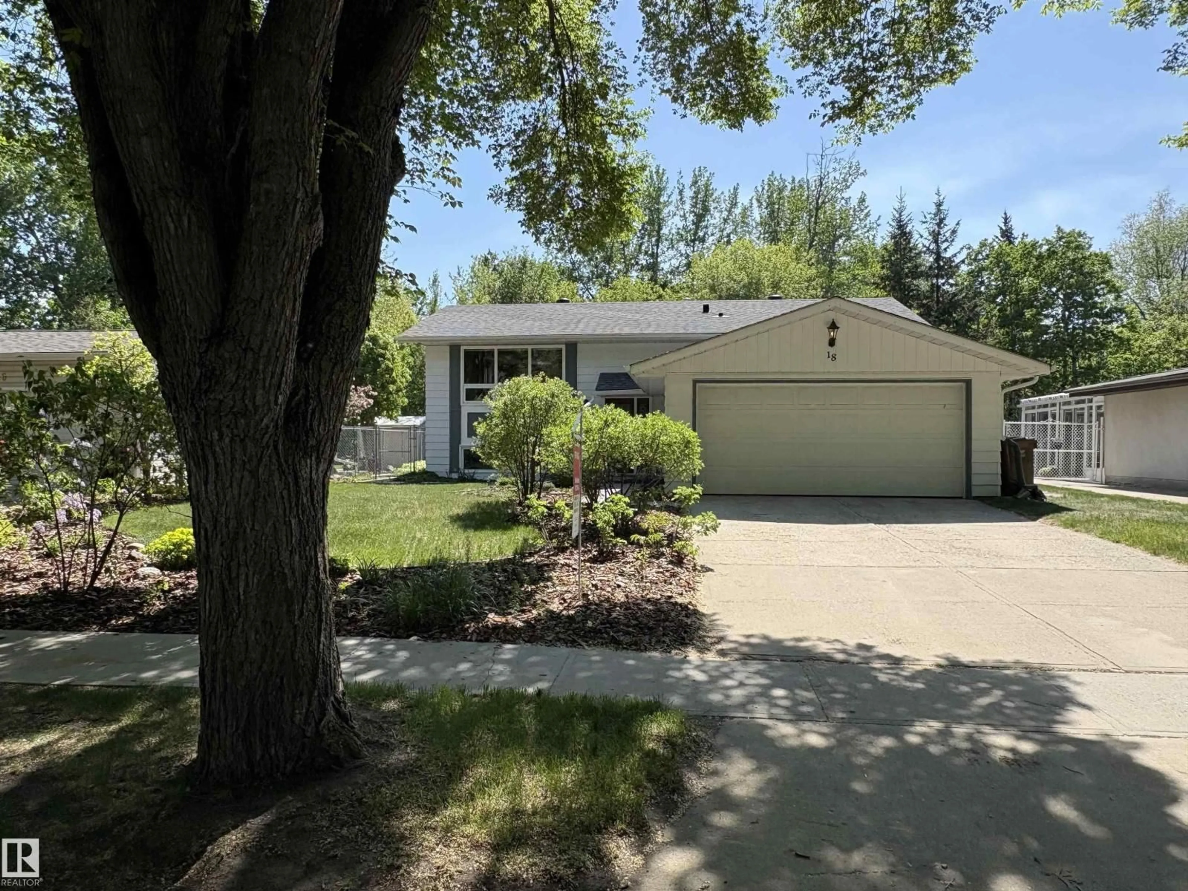 Home with vinyl exterior material, street for 18 FLINT CR, St. Albert Alberta T8N1Y8