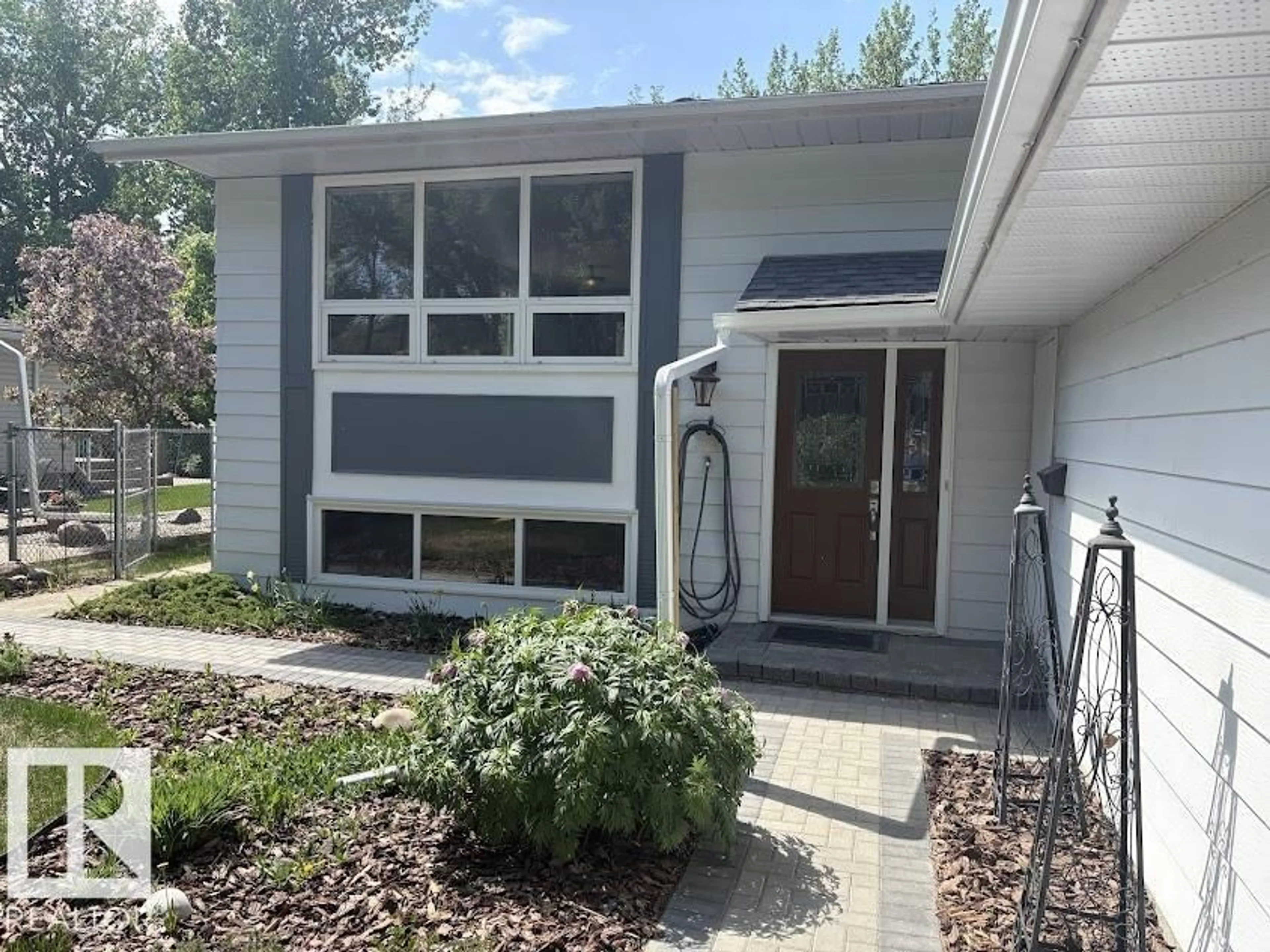 Home with vinyl exterior material, street for 18 FLINT CR, St. Albert Alberta T8N1Y8