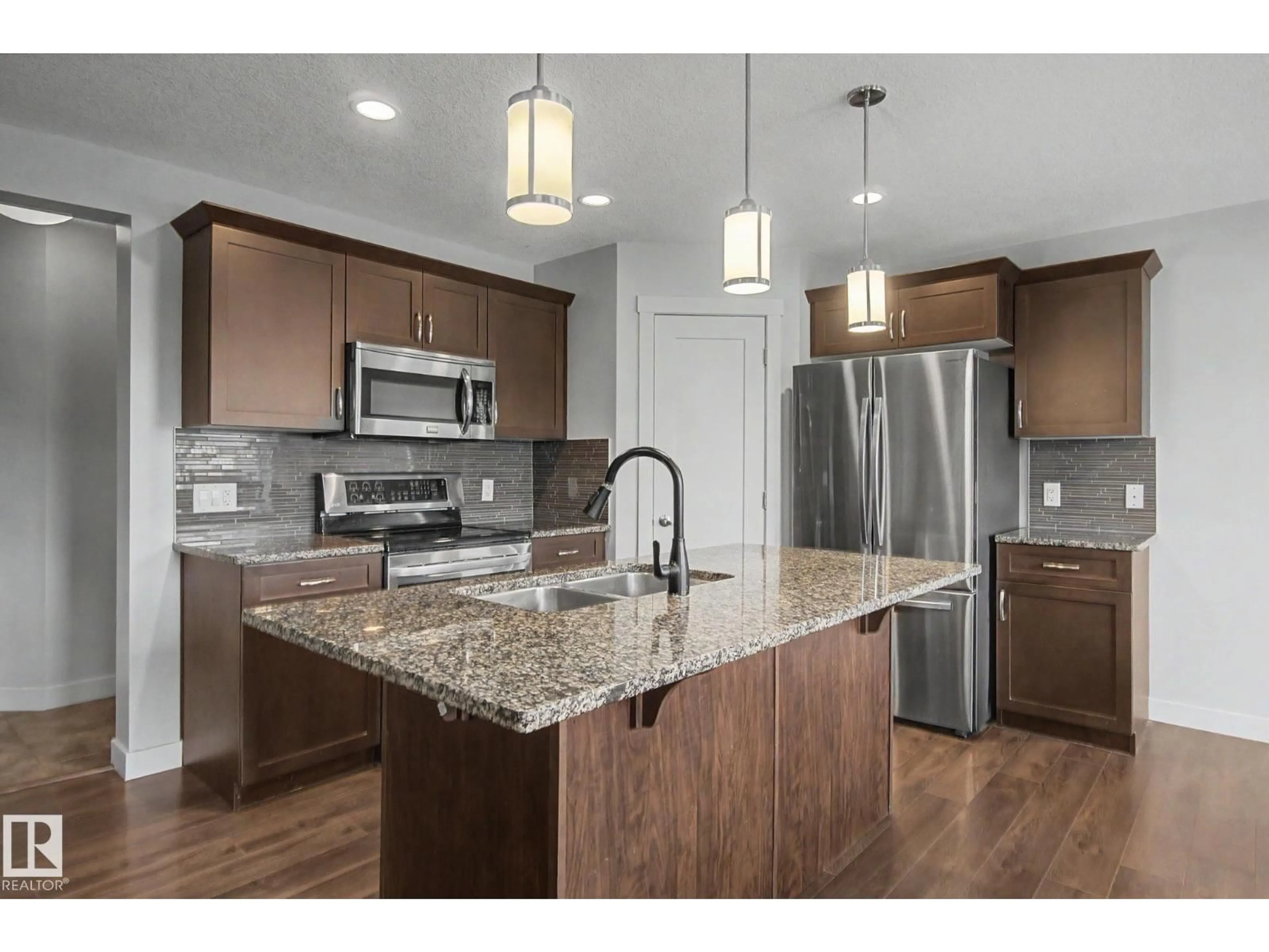 Open concept kitchen, unknown for NW - 4226 204 ST, Edmonton Alberta T6M0R8