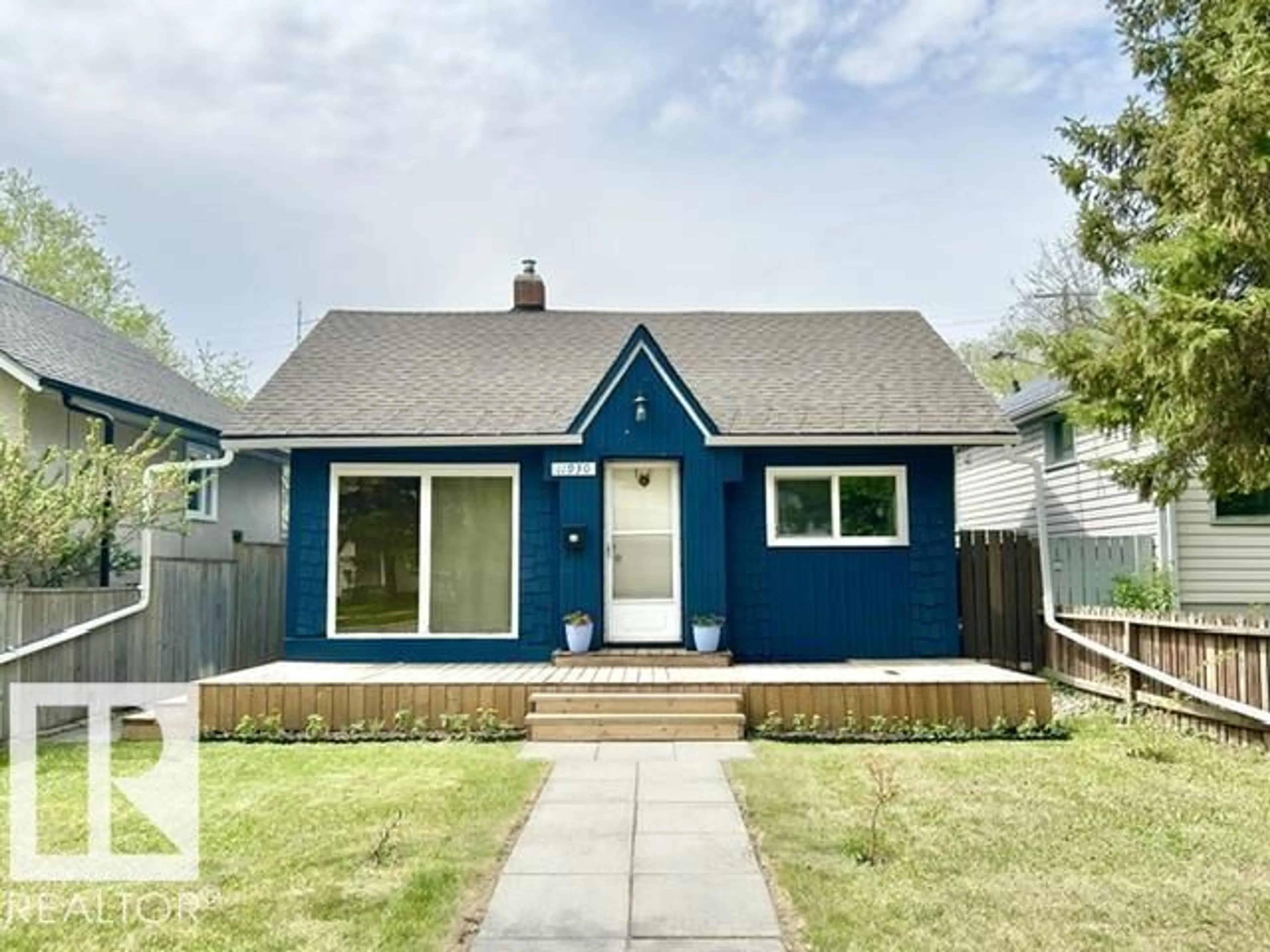 Home with vinyl exterior material, street for 11930 95A ST NW, Edmonton Alberta T5J1R5