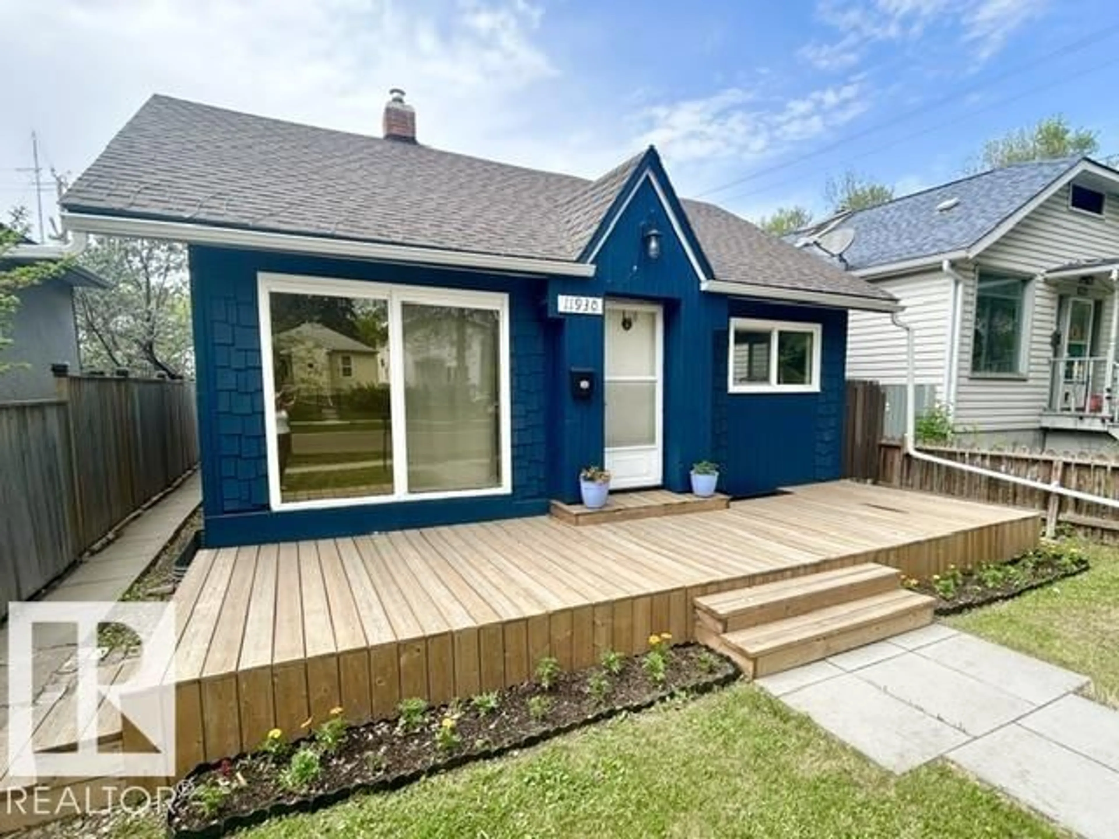 Home with vinyl exterior material, street for 11930 95A ST NW, Edmonton Alberta T5J1R5