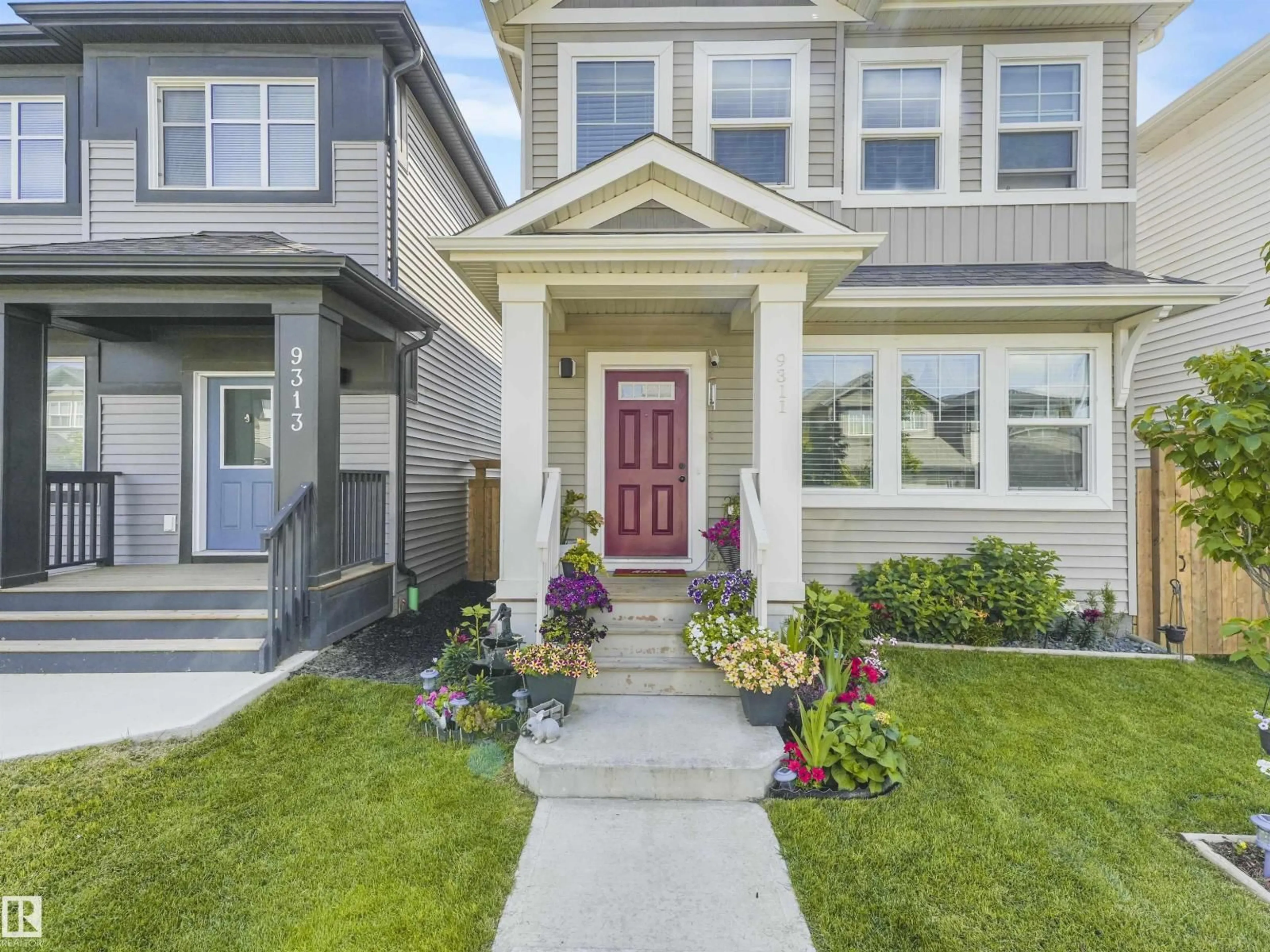 Home with vinyl exterior material, street for 9311 226 ST, Edmonton Alberta T5T7R5