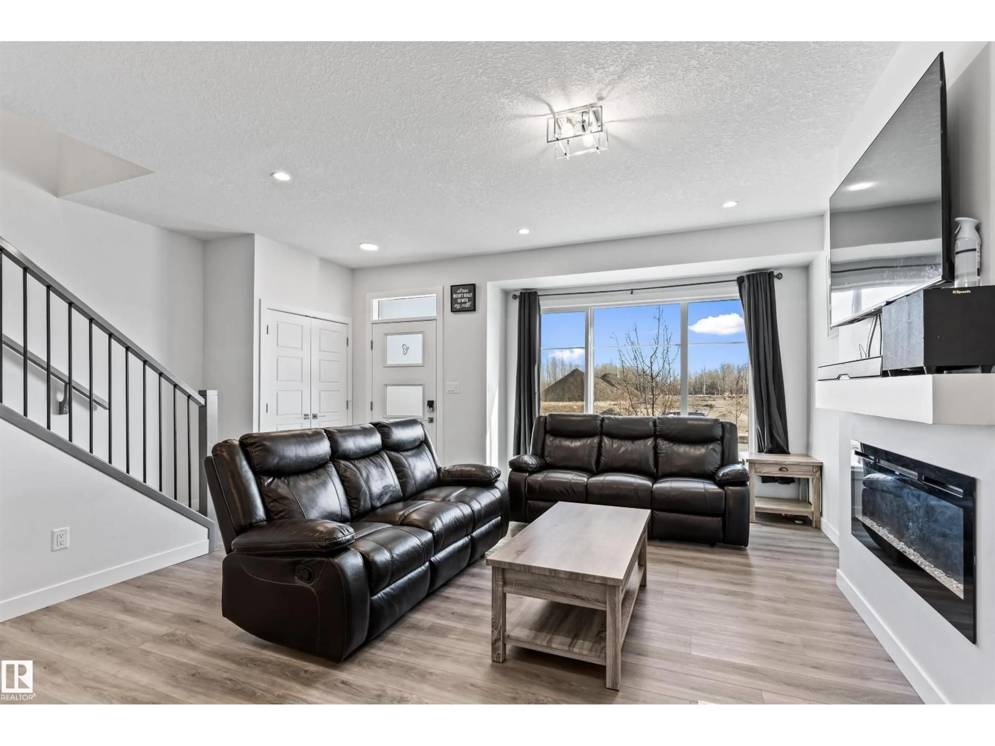 Living room with furniture, unknown for SW - 8046 KIRIAK LI, Edmonton Alberta T6W1A5