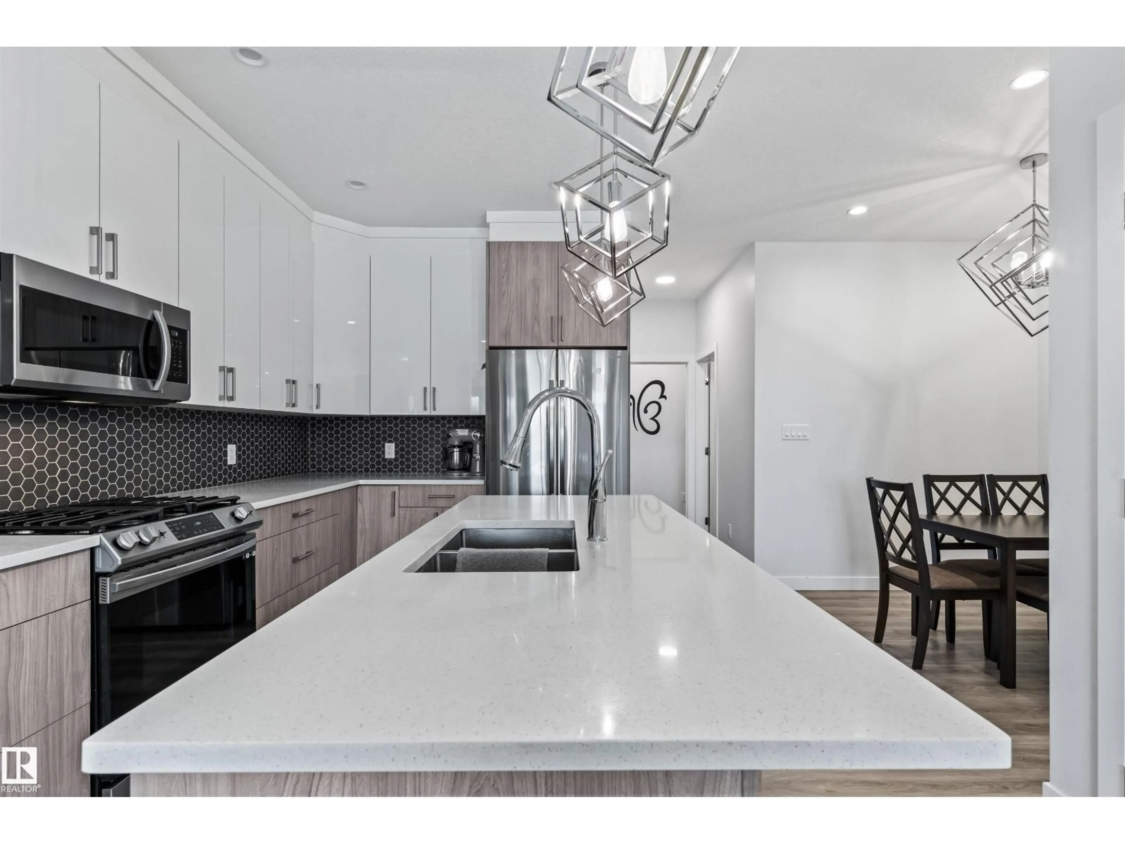 Open concept kitchen, ceramic/tile floor for SW - 8046 KIRIAK LI, Edmonton Alberta T6W1A5