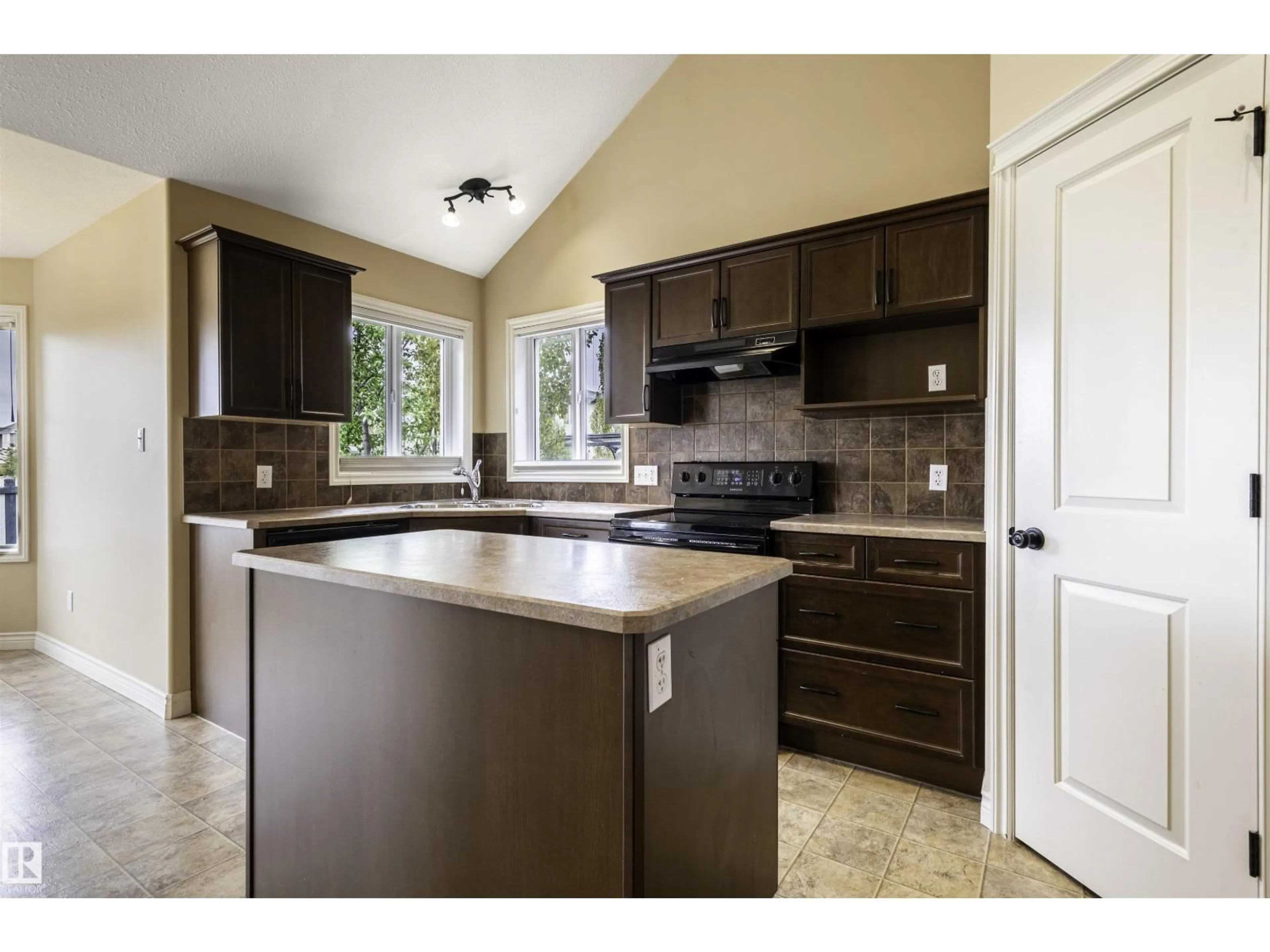 Open concept kitchen, ceramic/tile floor for 9811 103 AV, Morinville Alberta T8R1R7