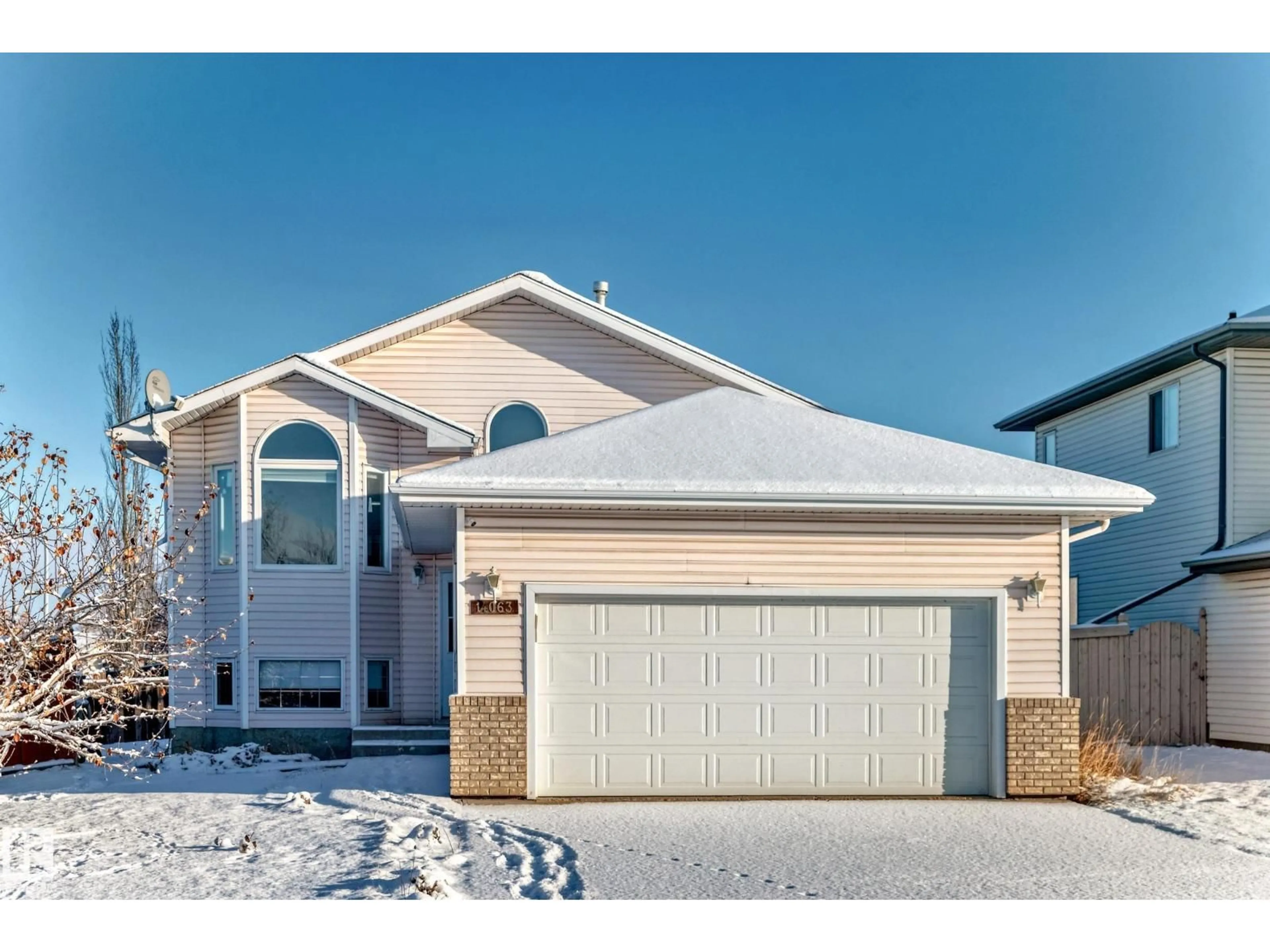 Home with vinyl exterior material, street for NW - 14063 128 ST, Edmonton Alberta T6V1K6