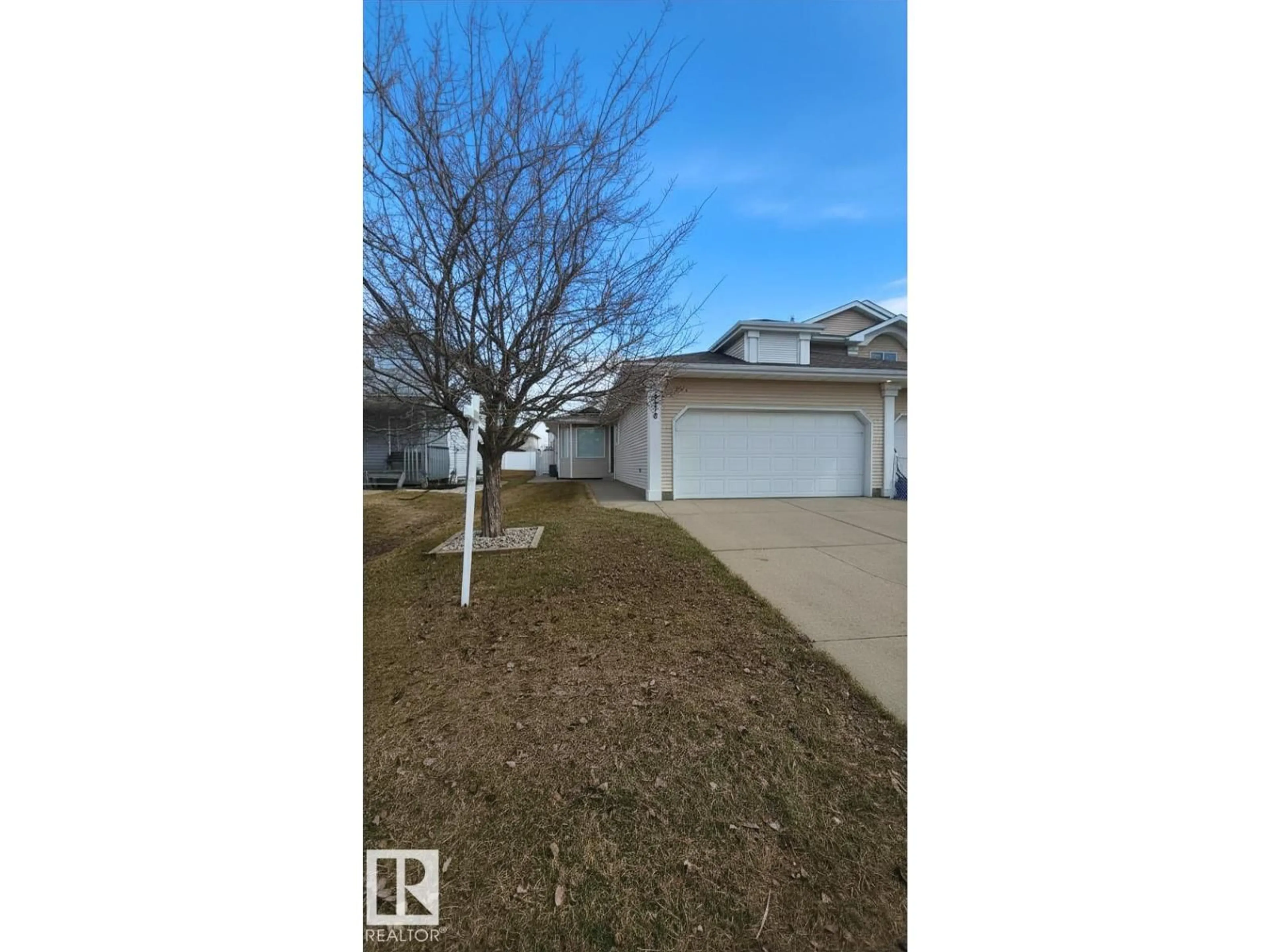 A pic from outside/outdoor area/front of a property/back of a property/a pic from drone, street for 9916 178 AV, Edmonton Alberta T5X5X2