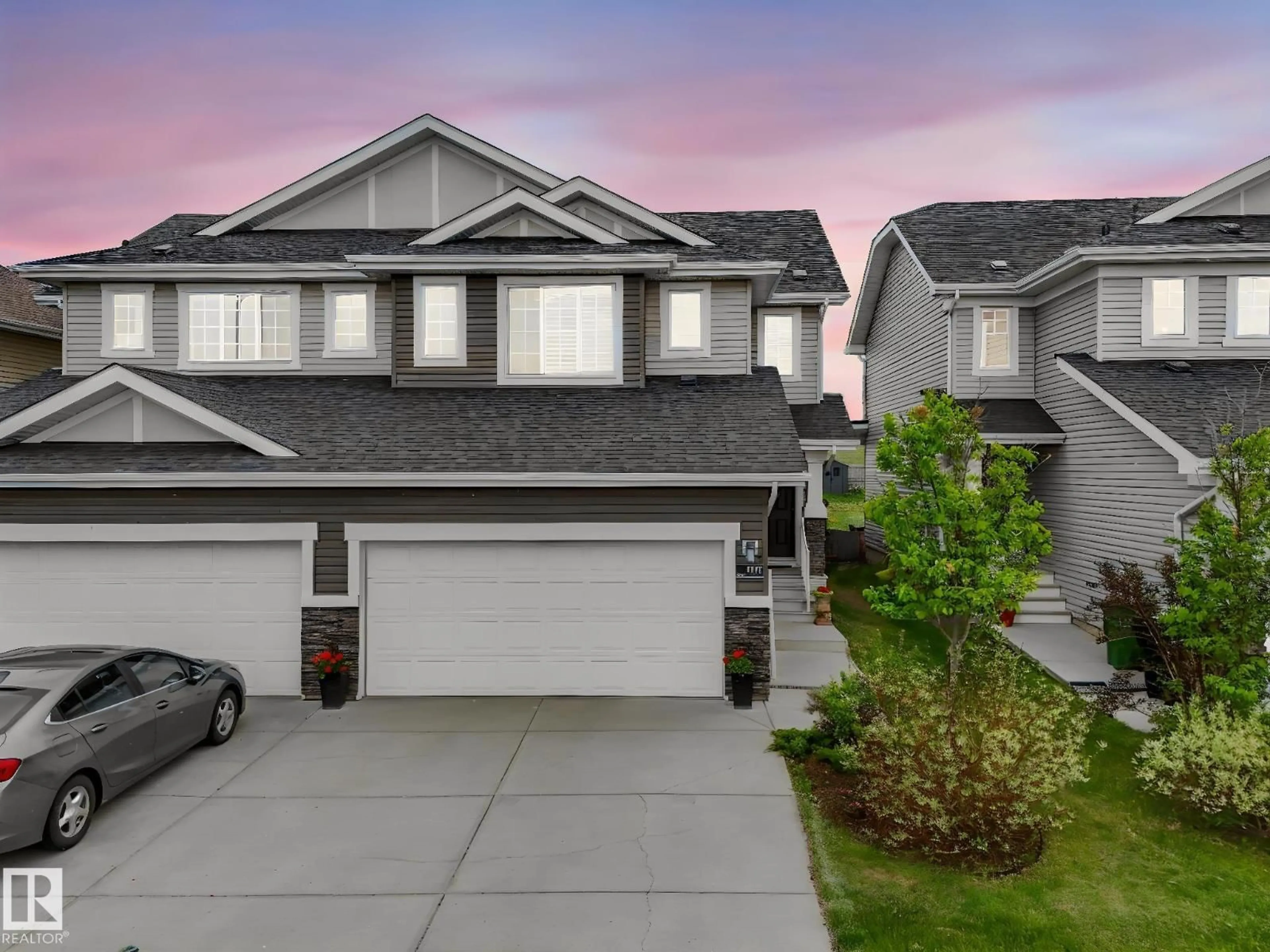 Home with vinyl exterior material, street for 1277 STARLING DR, Edmonton Alberta T5S0K4