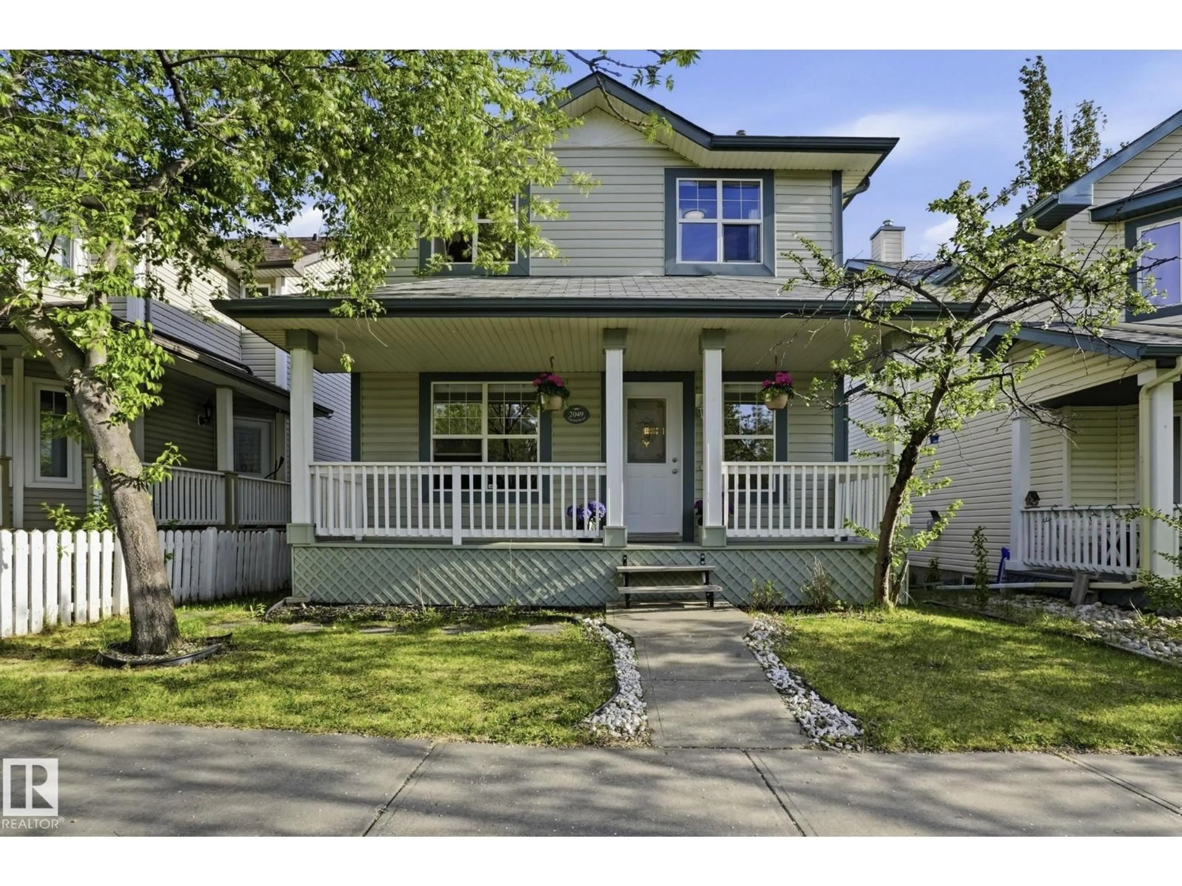 Home with vinyl exterior material, street for 2049 TANNER WD, Edmonton Alberta T6R2R4