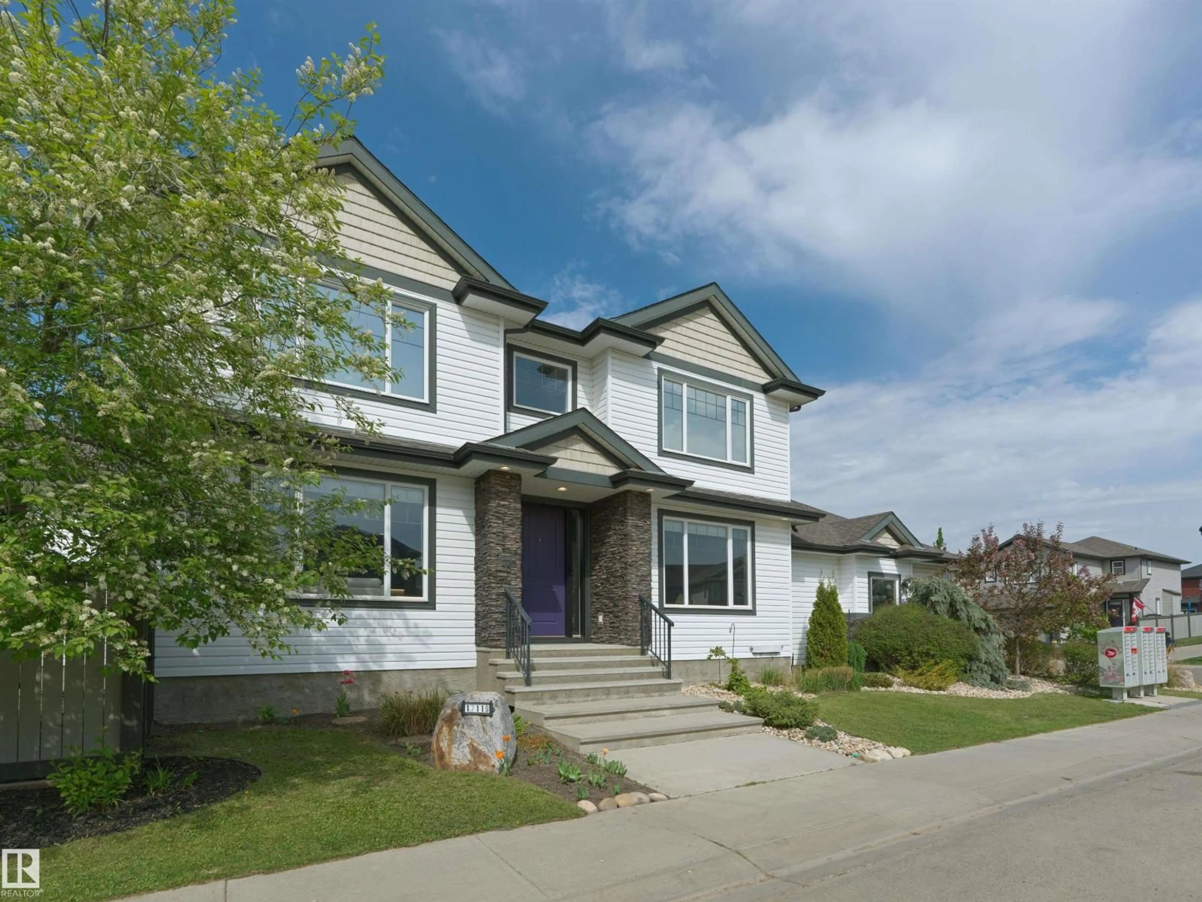 Home with vinyl exterior material, street for 17119 5 AV, Edmonton Alberta T6W2A4