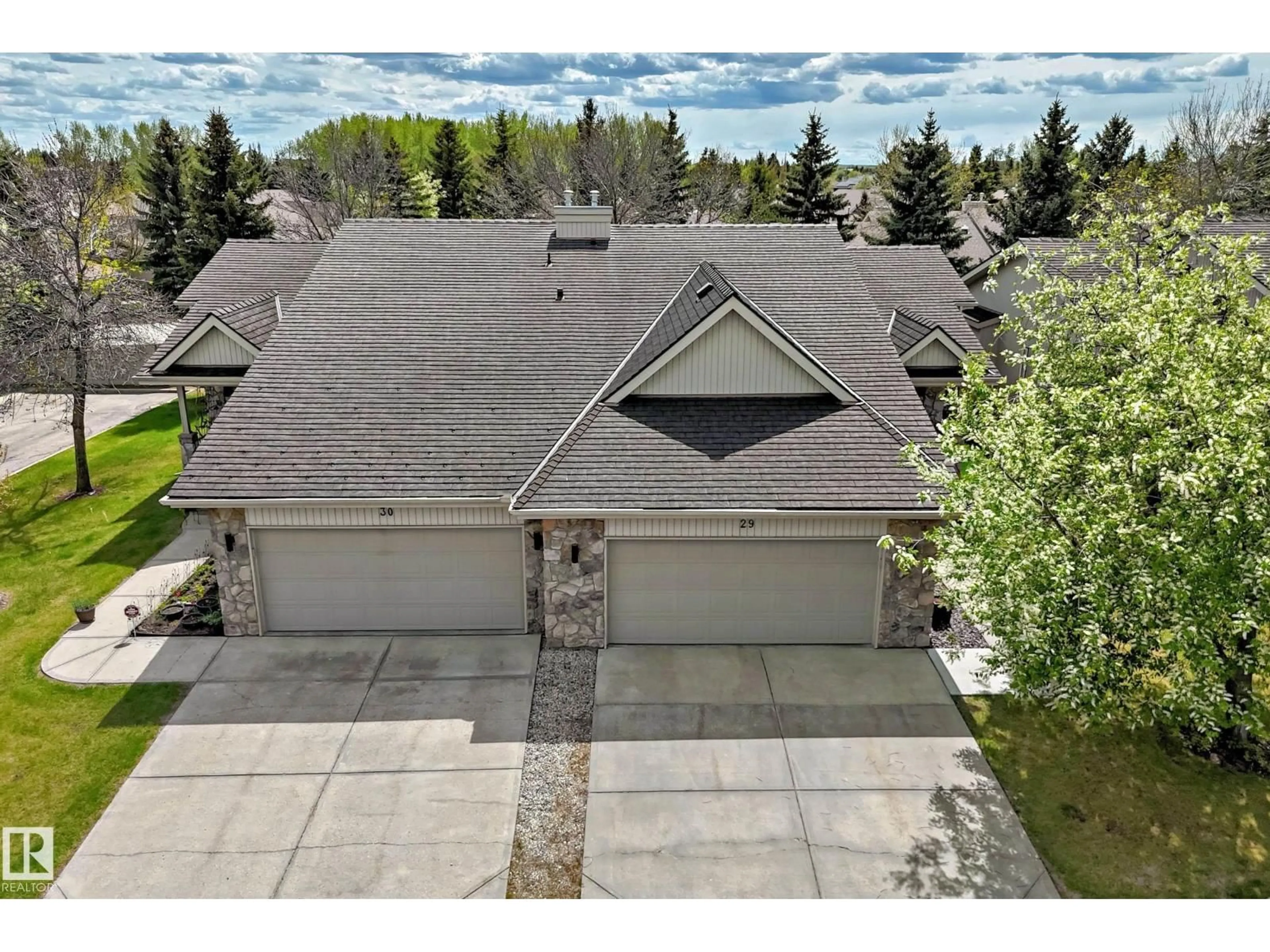 A pic from outside/outdoor area/front of a property/back of a property/a pic from drone, water/lake/river/ocean view for 929 - 29 PICARD DR, Edmonton Alberta T5T6J7