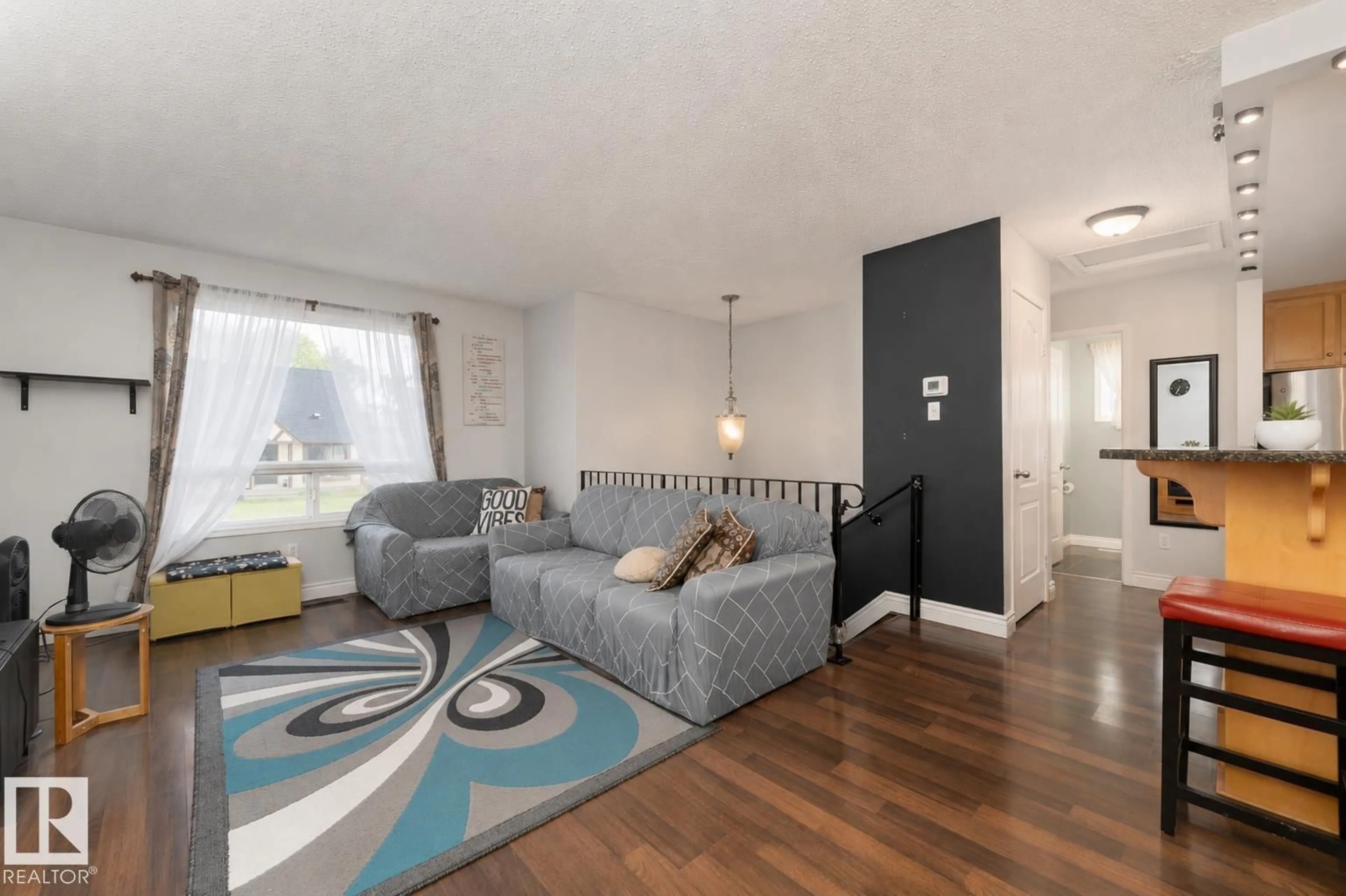 Living room with furniture, unknown for NW - 4620 37A AV, Edmonton Alberta T6L3A6