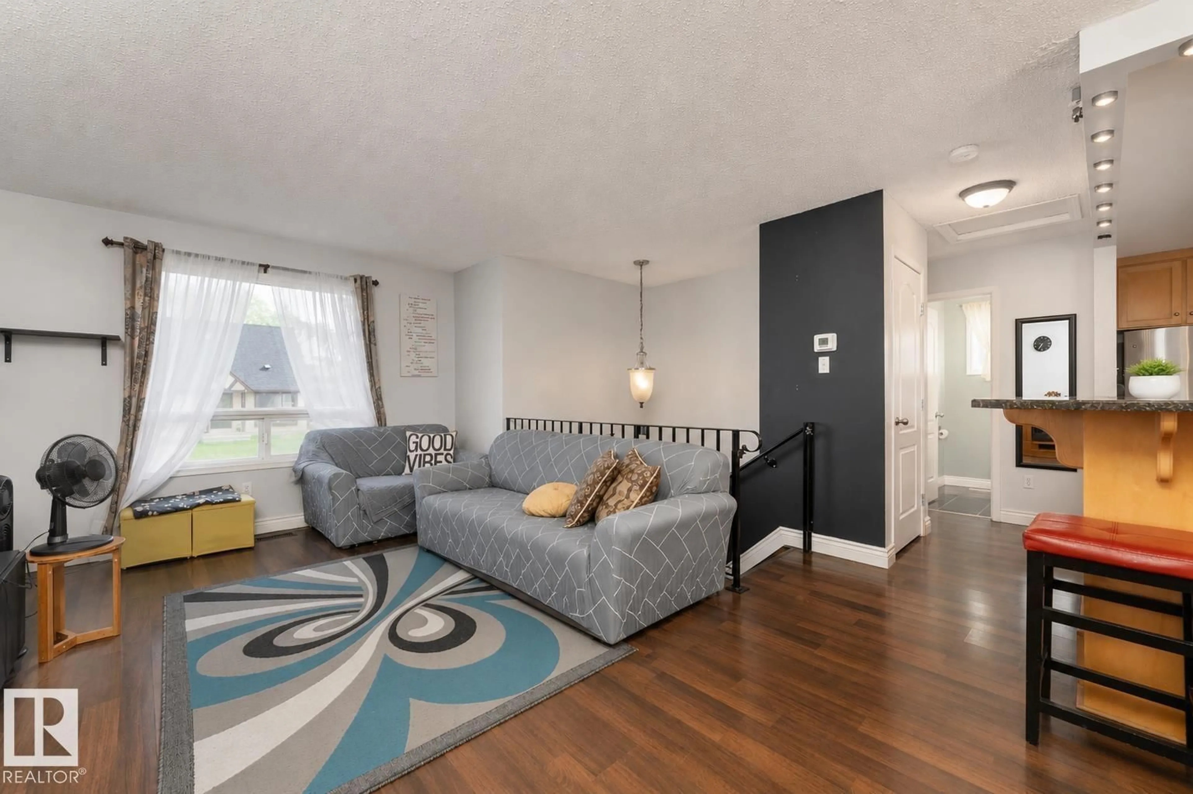 Living room with furniture, unknown for NW - 4620 37A AV, Edmonton Alberta T6L3A6