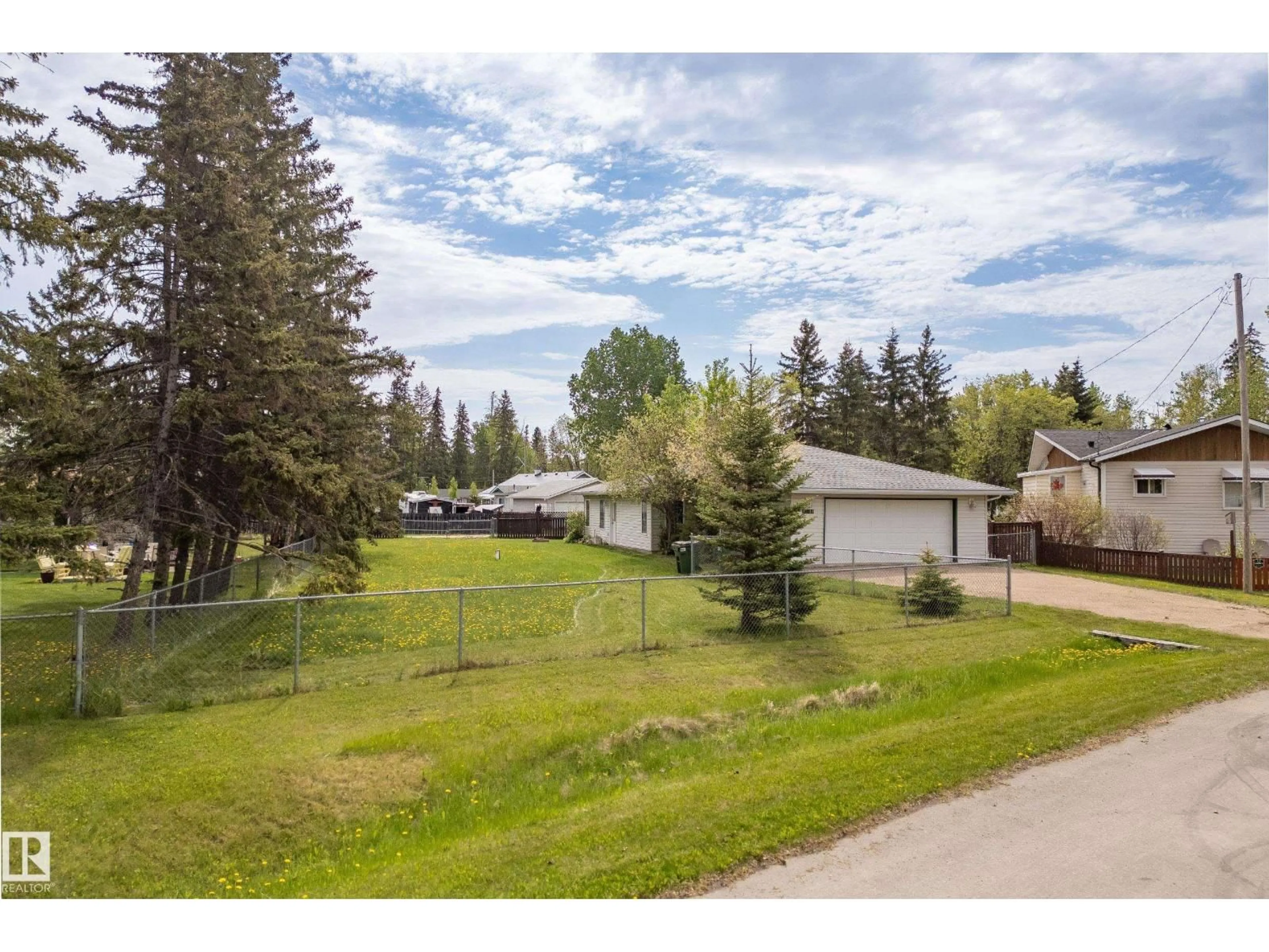 A pic from outside/outdoor area/front of a property/back of a property/a pic from drone, street for 5011 64 ST, Rural Lac Ste. Anne County Alberta T0E0A0