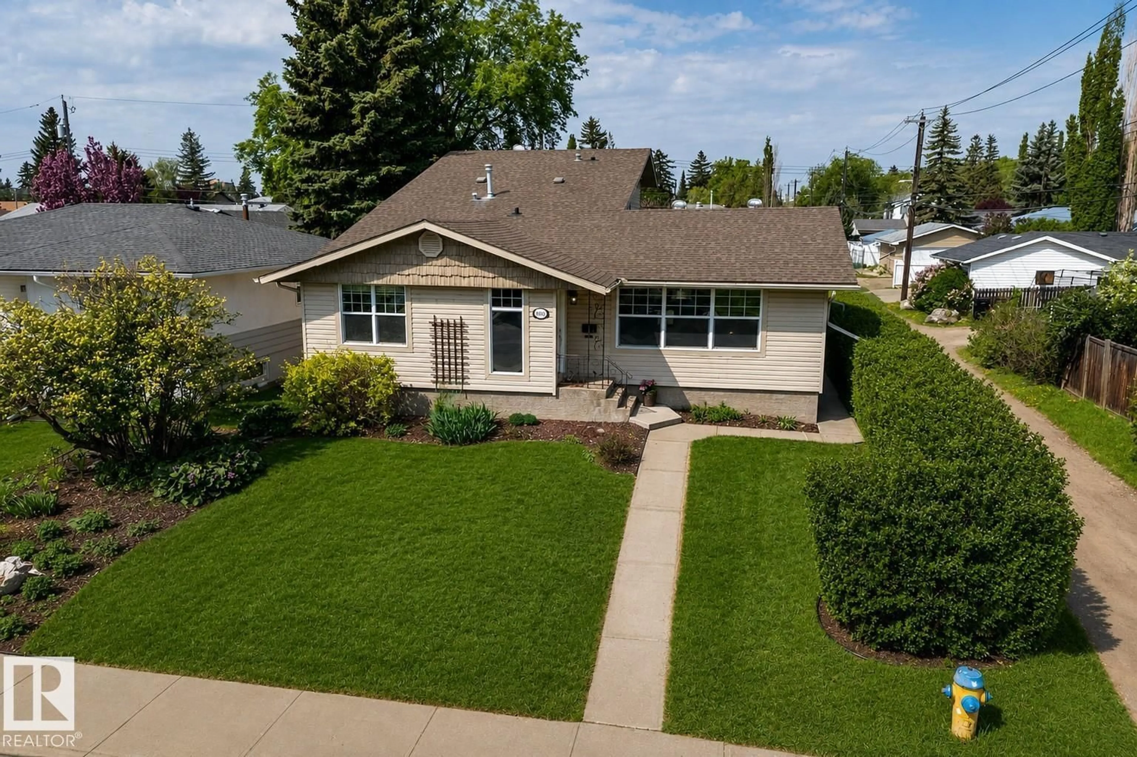 A pic from outside/outdoor area/front of a property/back of a property/a pic from drone, street for 9036 145 ST, Edmonton Alberta T5R0V2