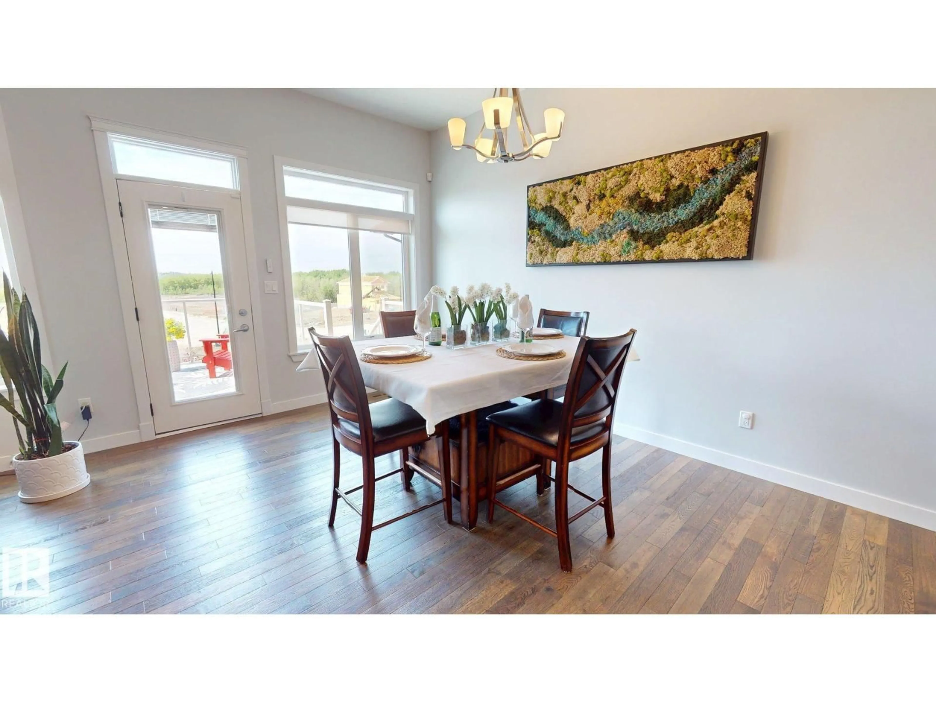 Dining room, wood/laminate floor for 42 COTTONWOOD CR, Fort Saskatchewan Alberta T8L0H8