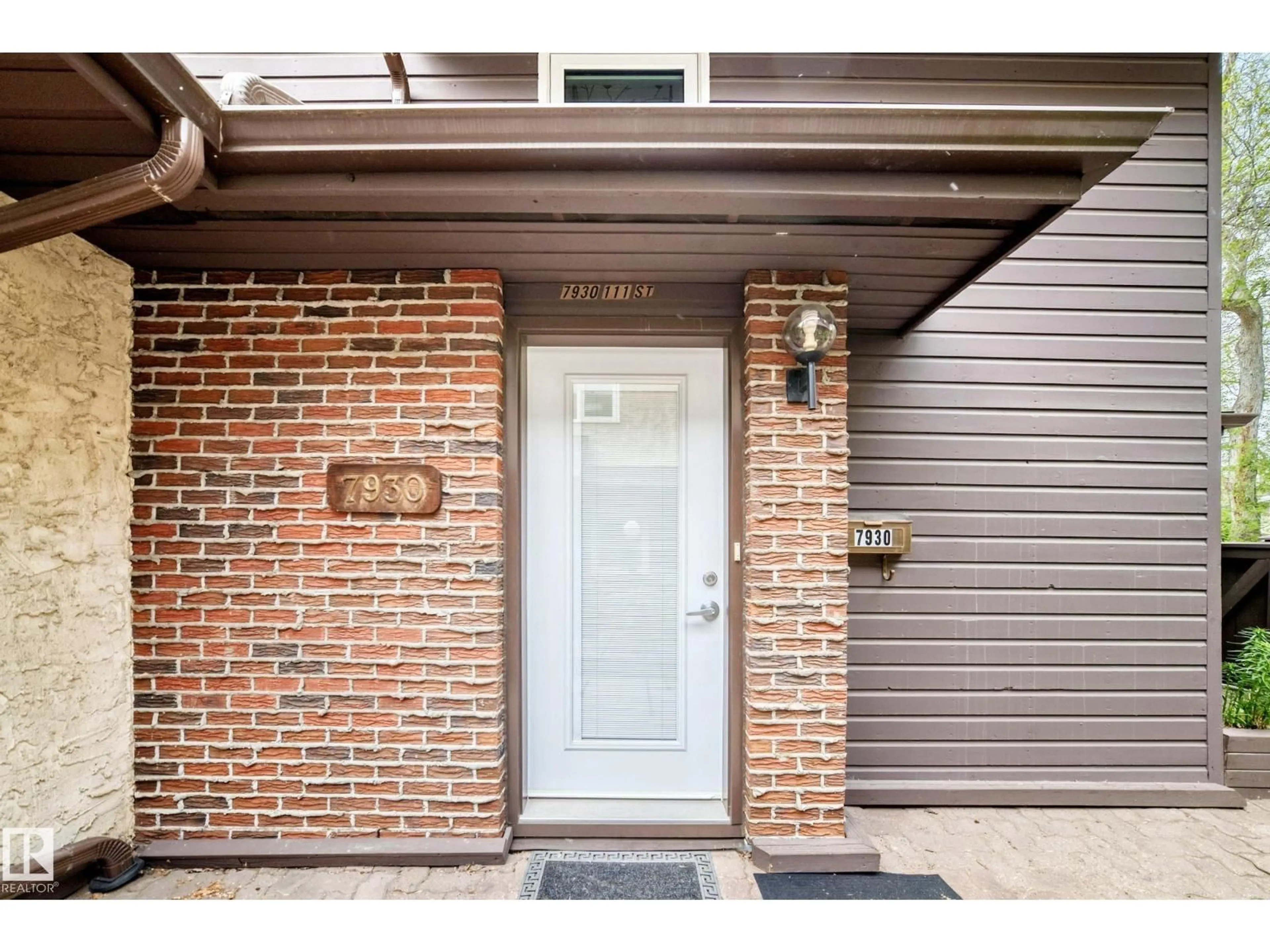 Home with brick exterior material, street for 7930 111 ST, Edmonton Alberta T6G2R2