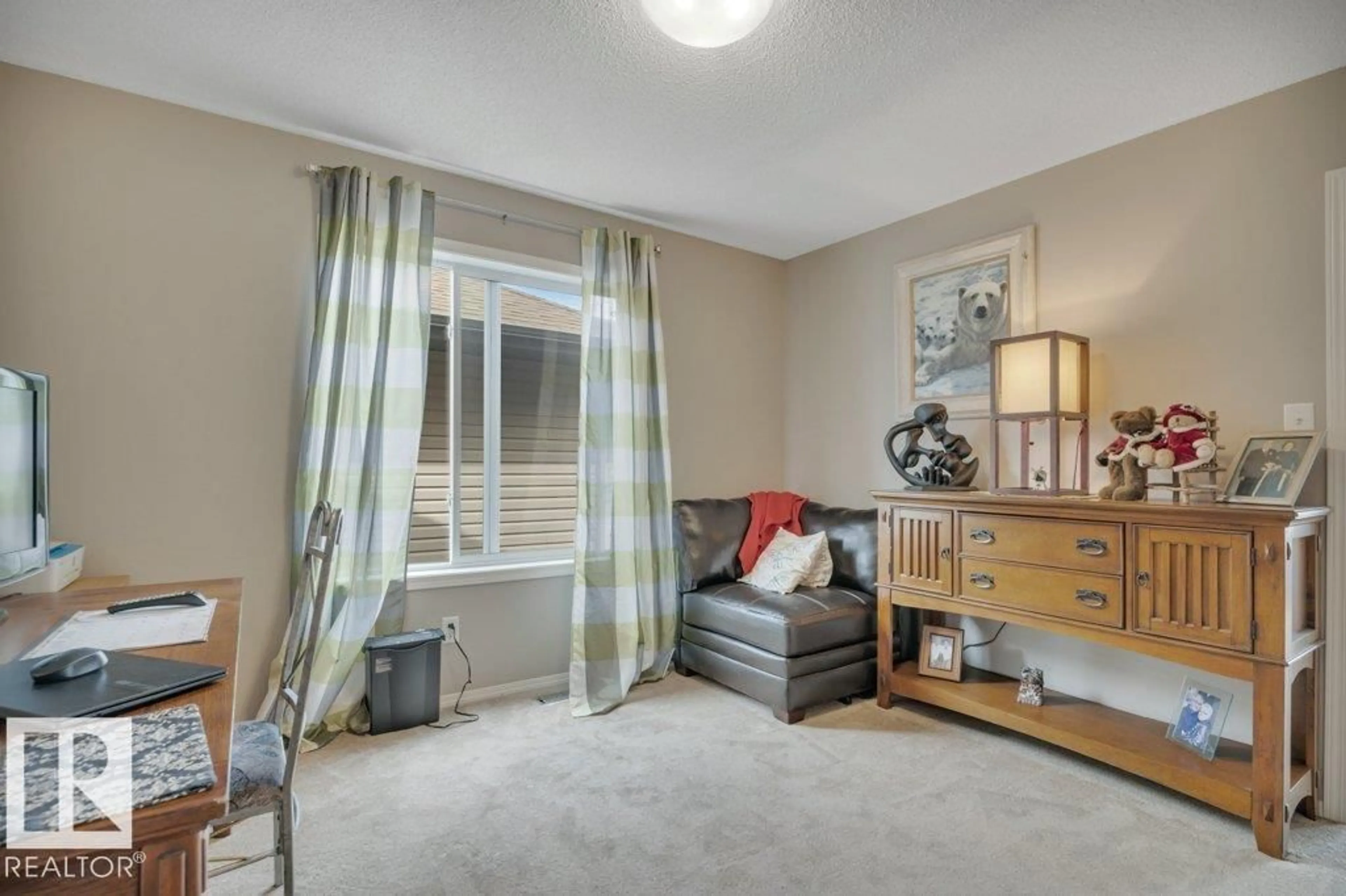Living room with furniture, carpet floor for NW - 6042 214 ST, Edmonton Alberta T6M0K1