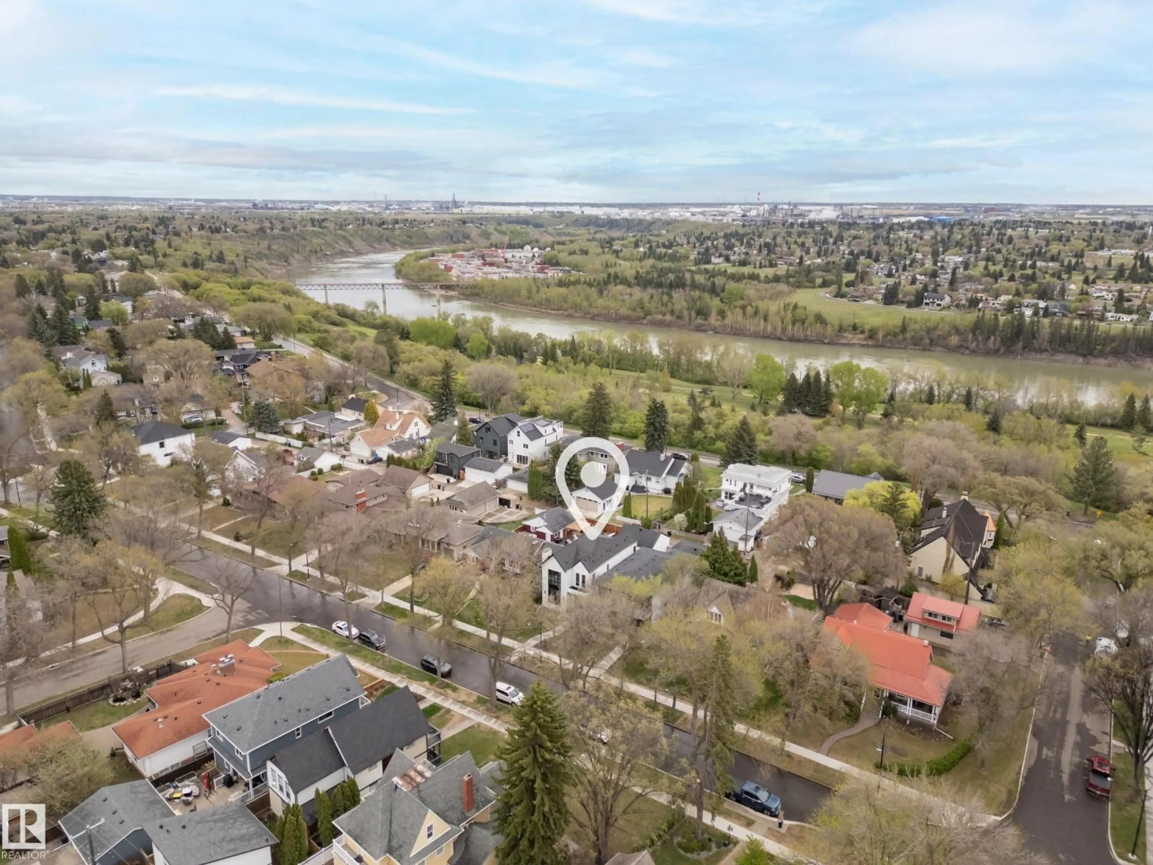 A pic from outside/outdoor area/front of a property/back of a property/a pic from drone, water/lake/river/ocean view for 6115 111 AV, Edmonton Alberta T5W0L1