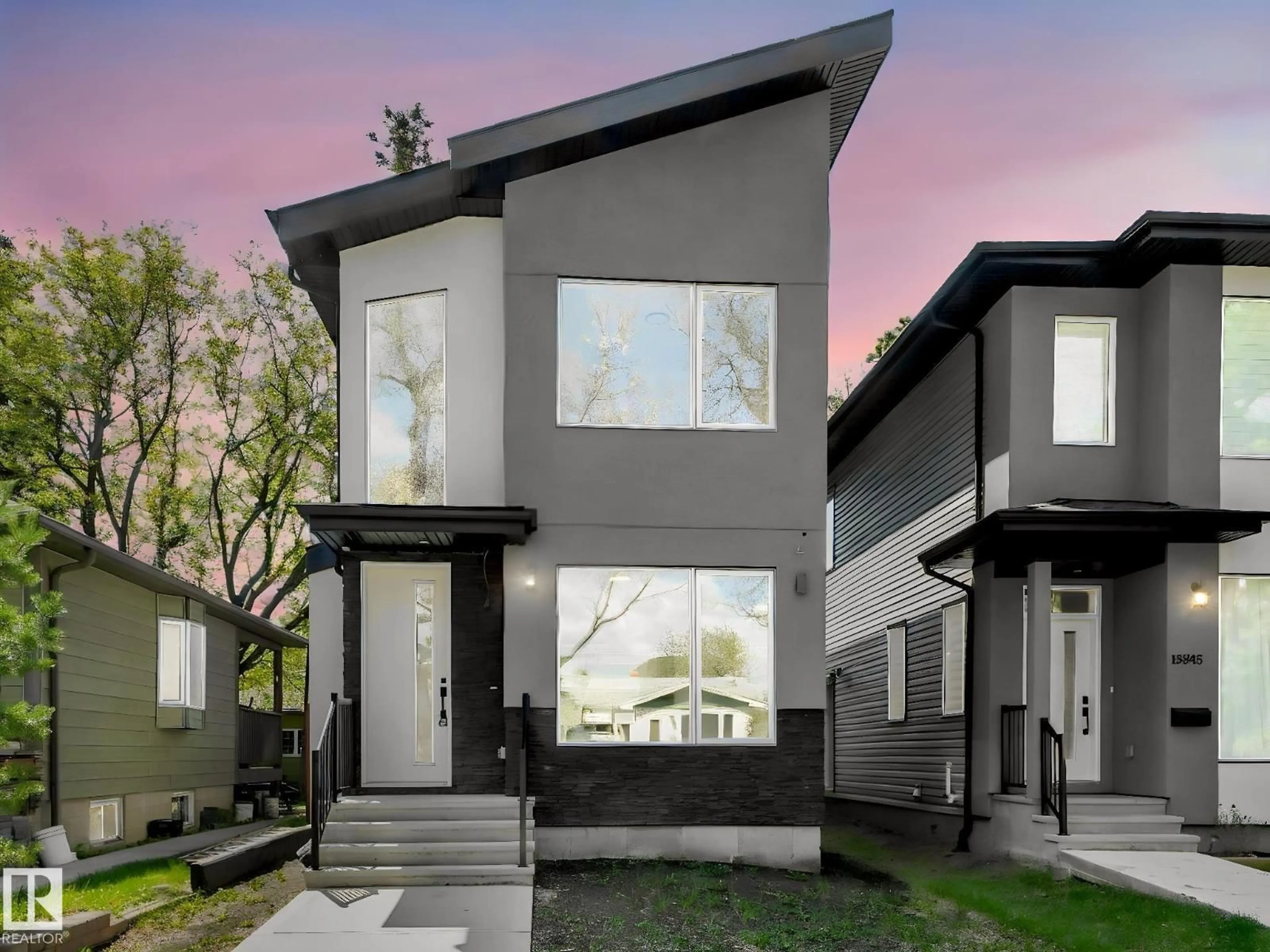 Home with vinyl exterior material, street for 13843 110A AV, Edmonton Alberta T5M2N1