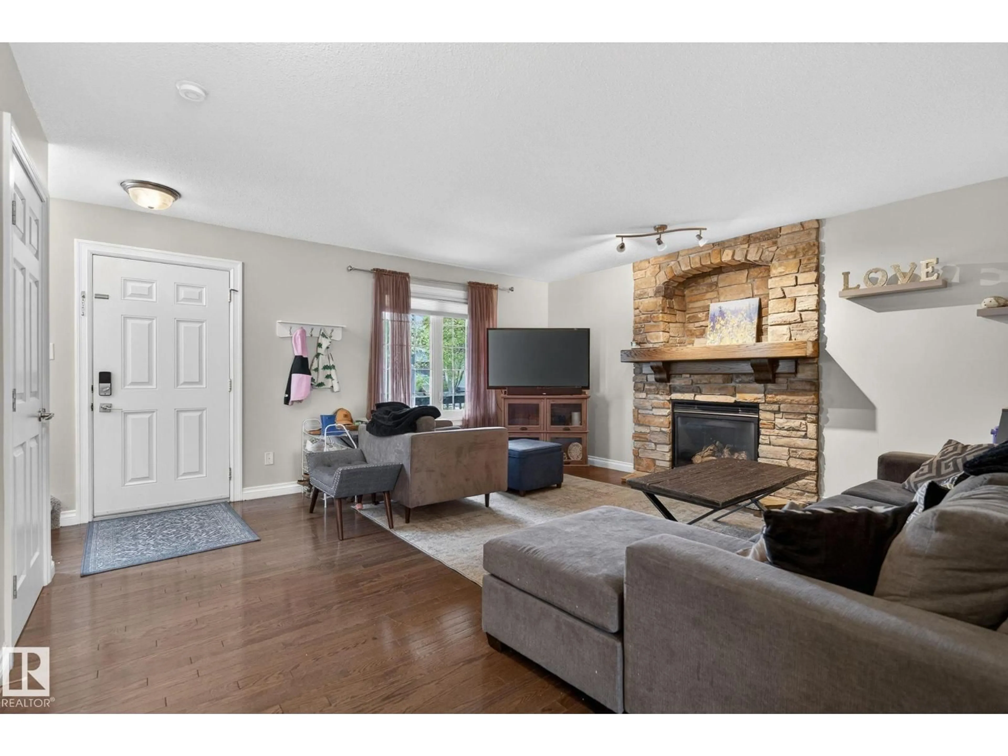 Living room with furniture, unknown for 1844 TOWNE CENTRE BV, Edmonton Alberta T6R3B7