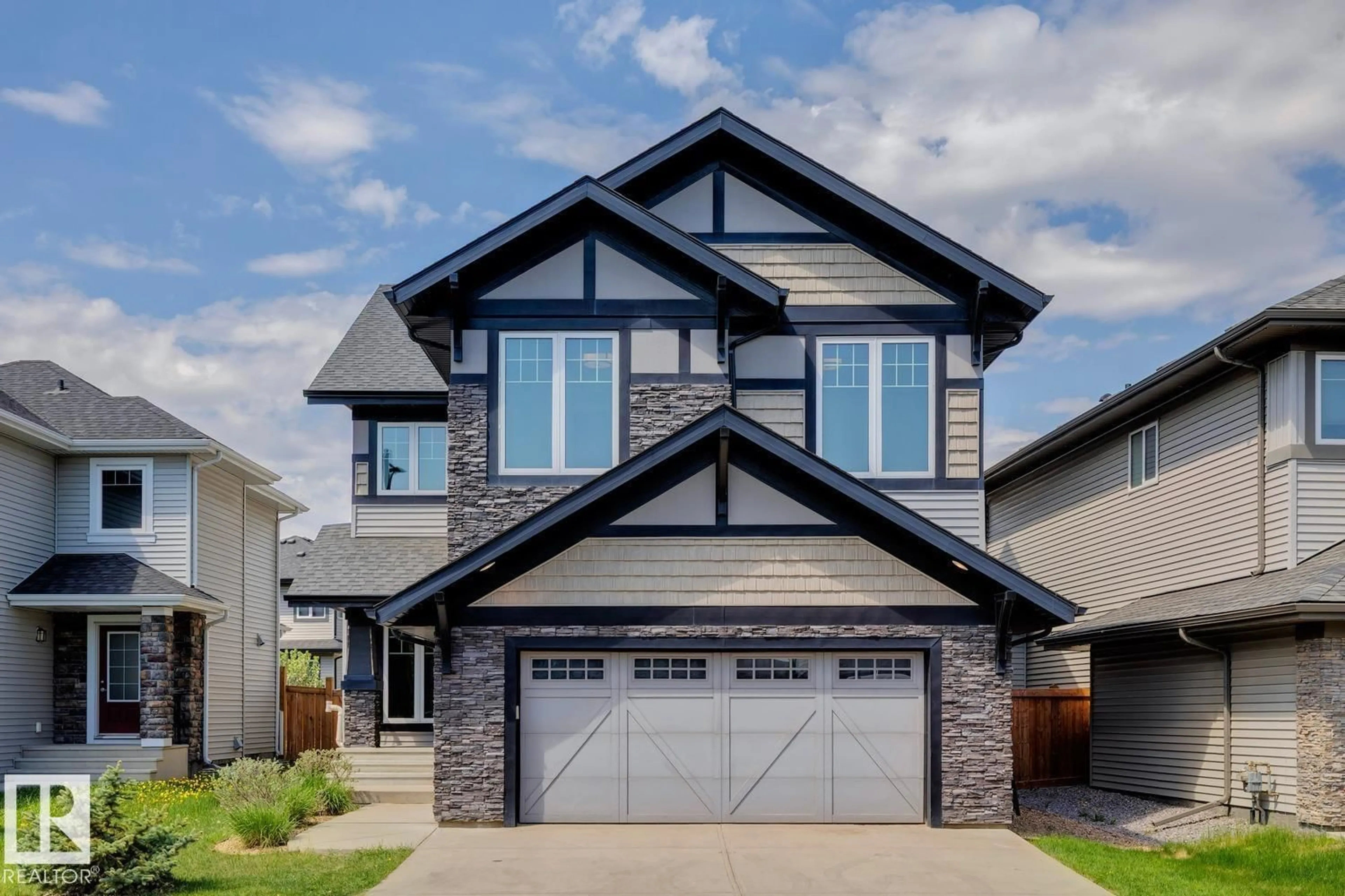 Home with vinyl exterior material, street for SW - 2545 AMEROGEN CR, Edmonton Alberta T6W3C2