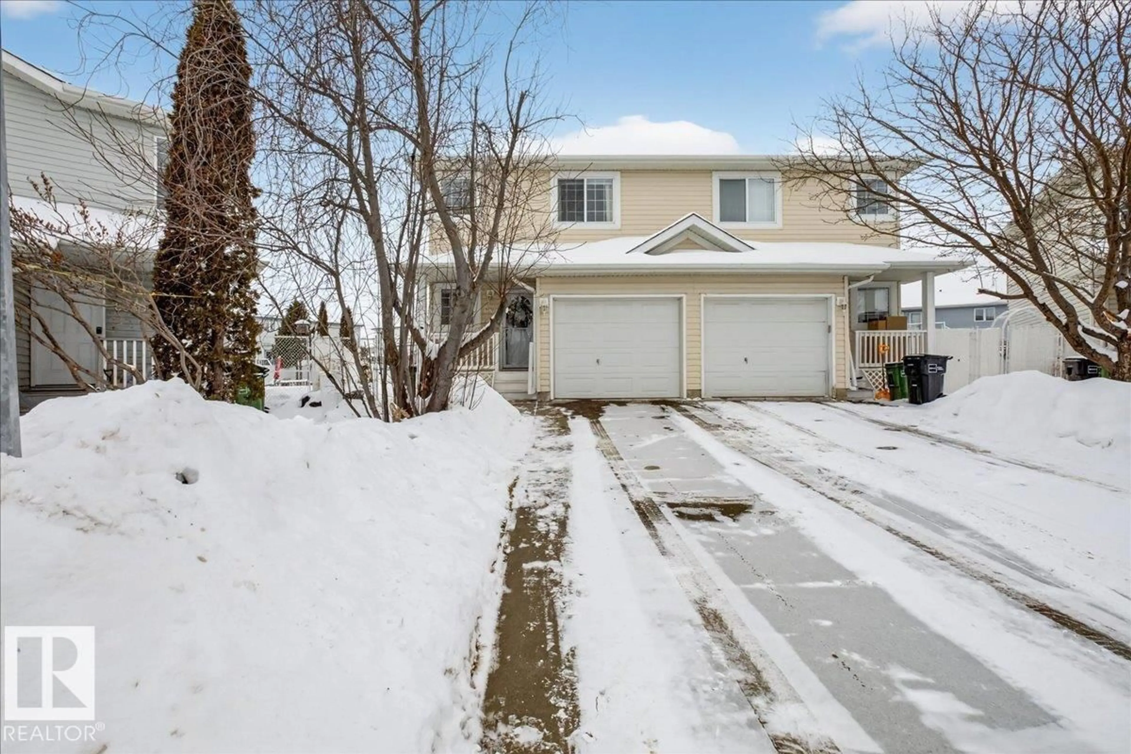 A pic from outside/outdoor area/front of a property/back of a property/a pic from drone, street for 6828 159A AV, Edmonton Alberta T5Z3N9