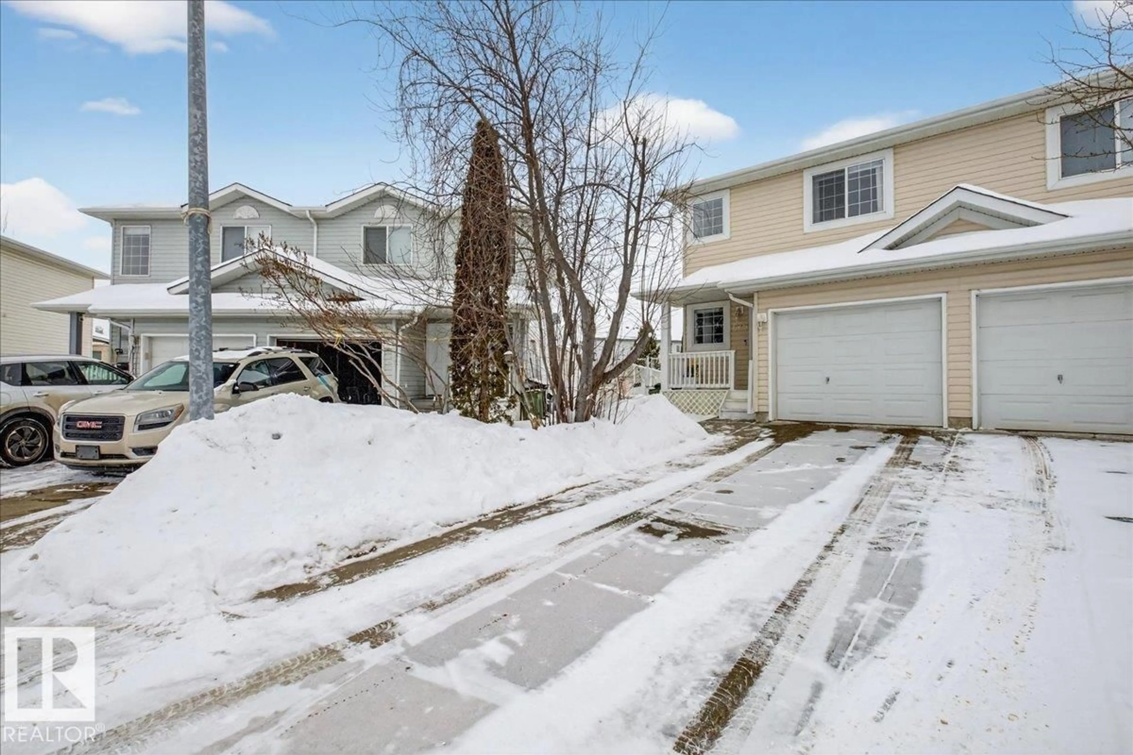 A pic from outside/outdoor area/front of a property/back of a property/a pic from drone, street for 6828 159A AV, Edmonton Alberta T5Z3N9